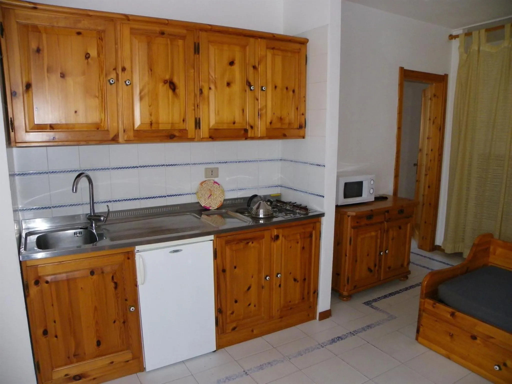 Kitchen or kitchenette in Residence Buganvillea