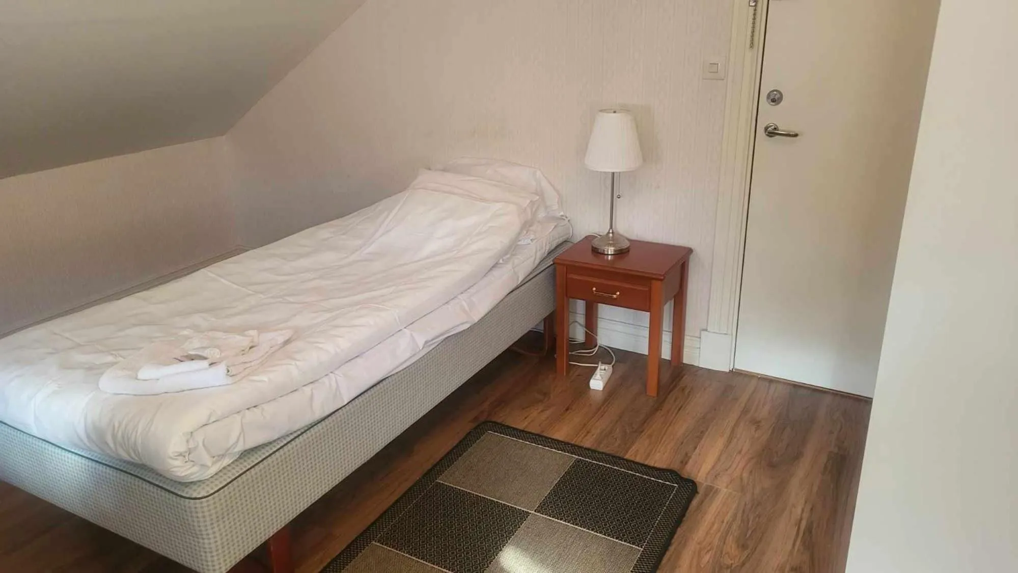 Bed in Hotell Mikaelsgården