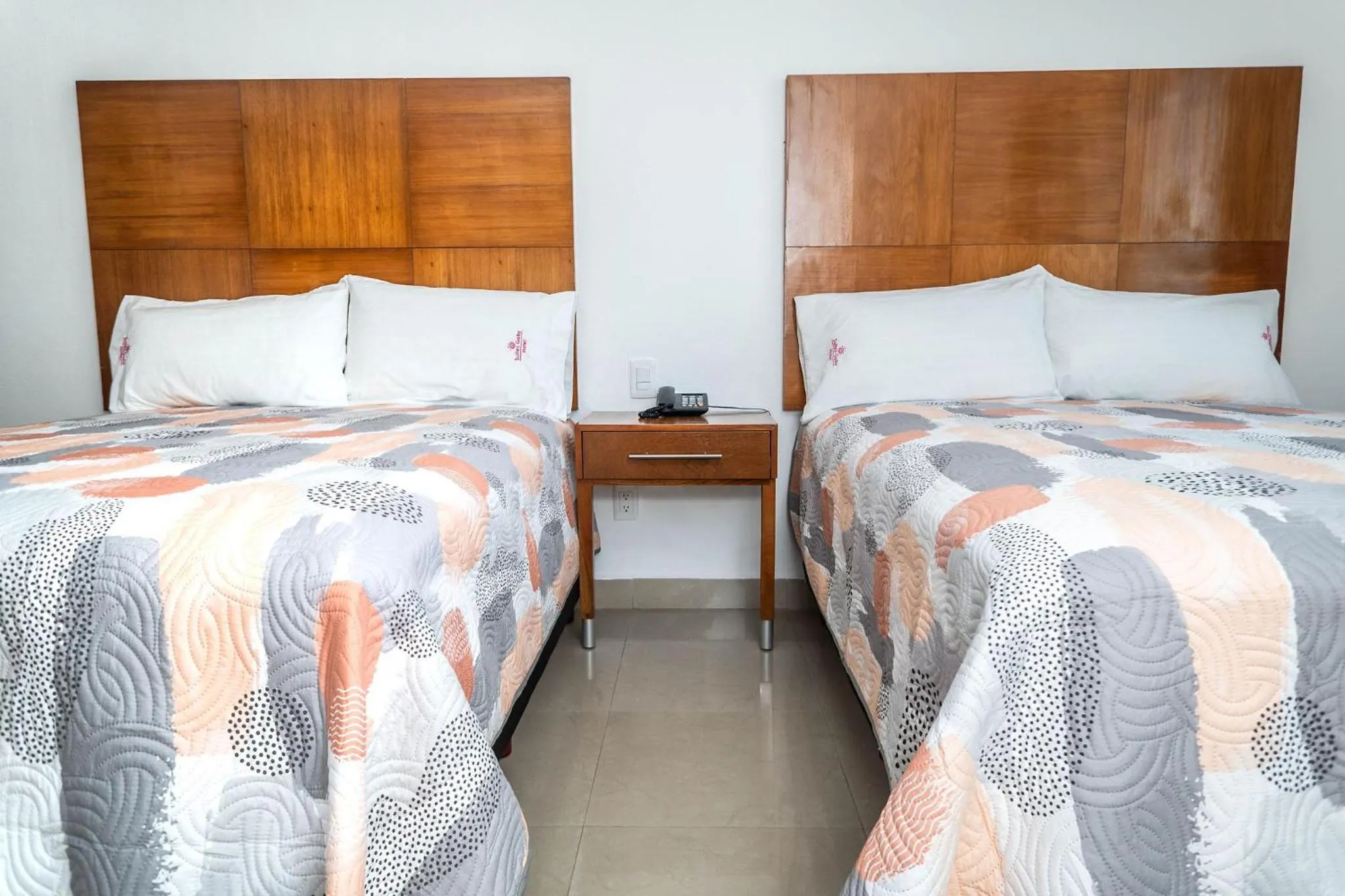 Bed in Hotel Suites Gaby