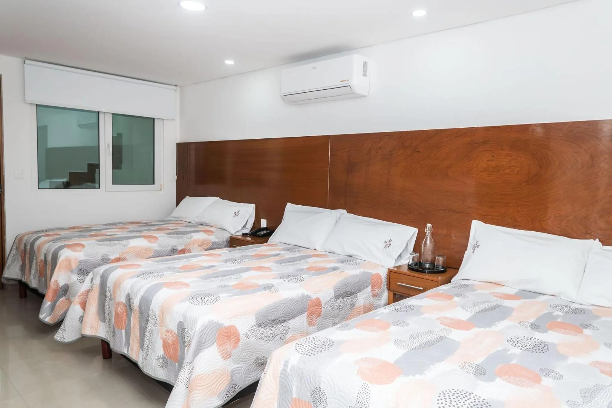 Bed in Hotel Suites Gaby