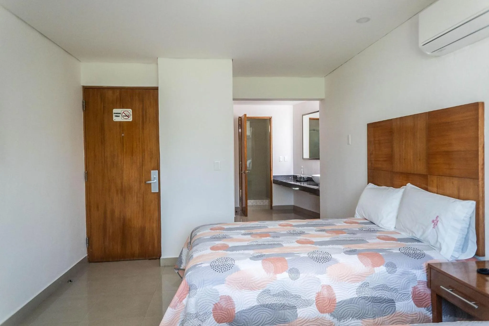 Bed in Hotel Suites Gaby