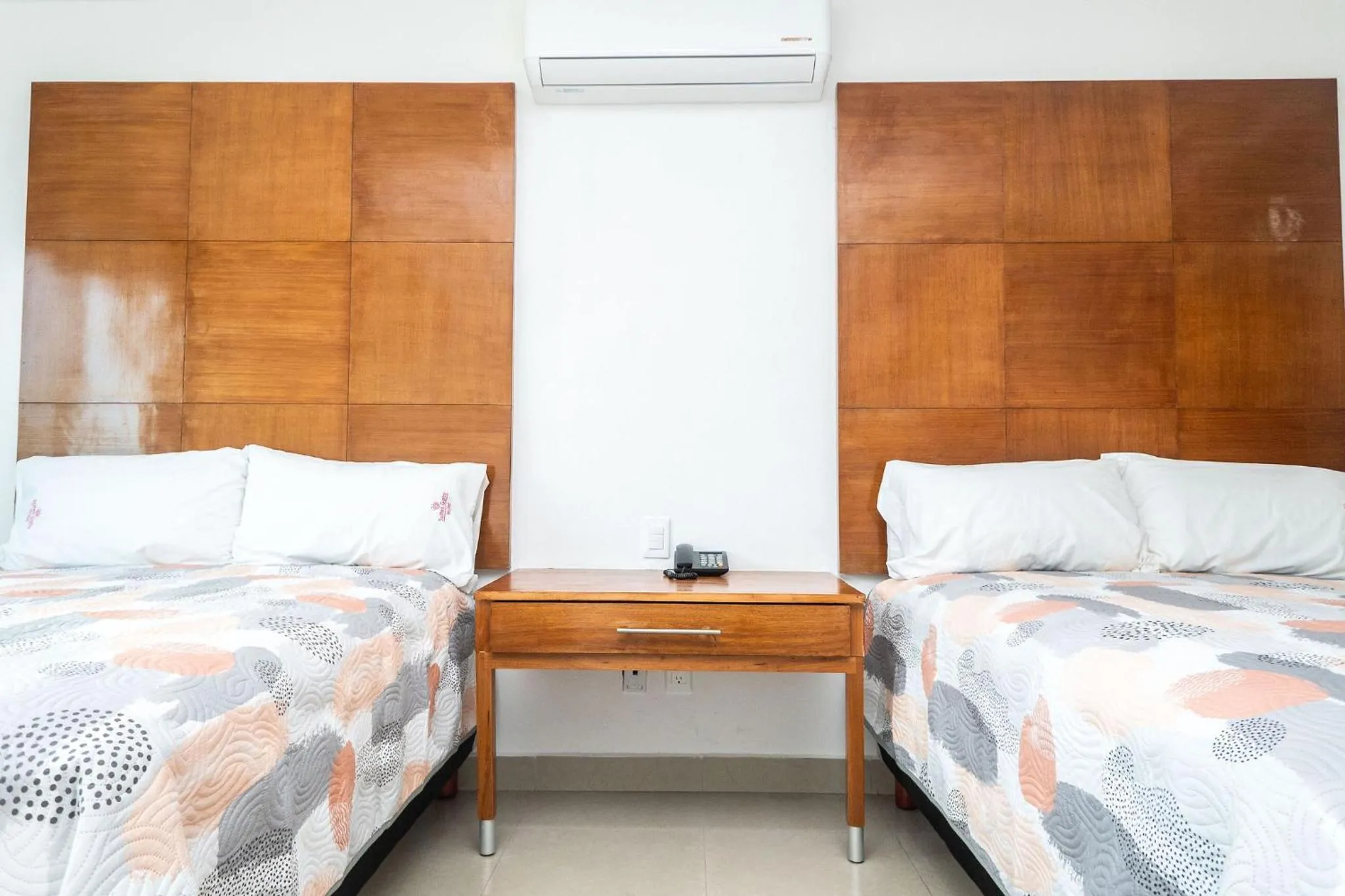 Bed in Hotel Suites Gaby