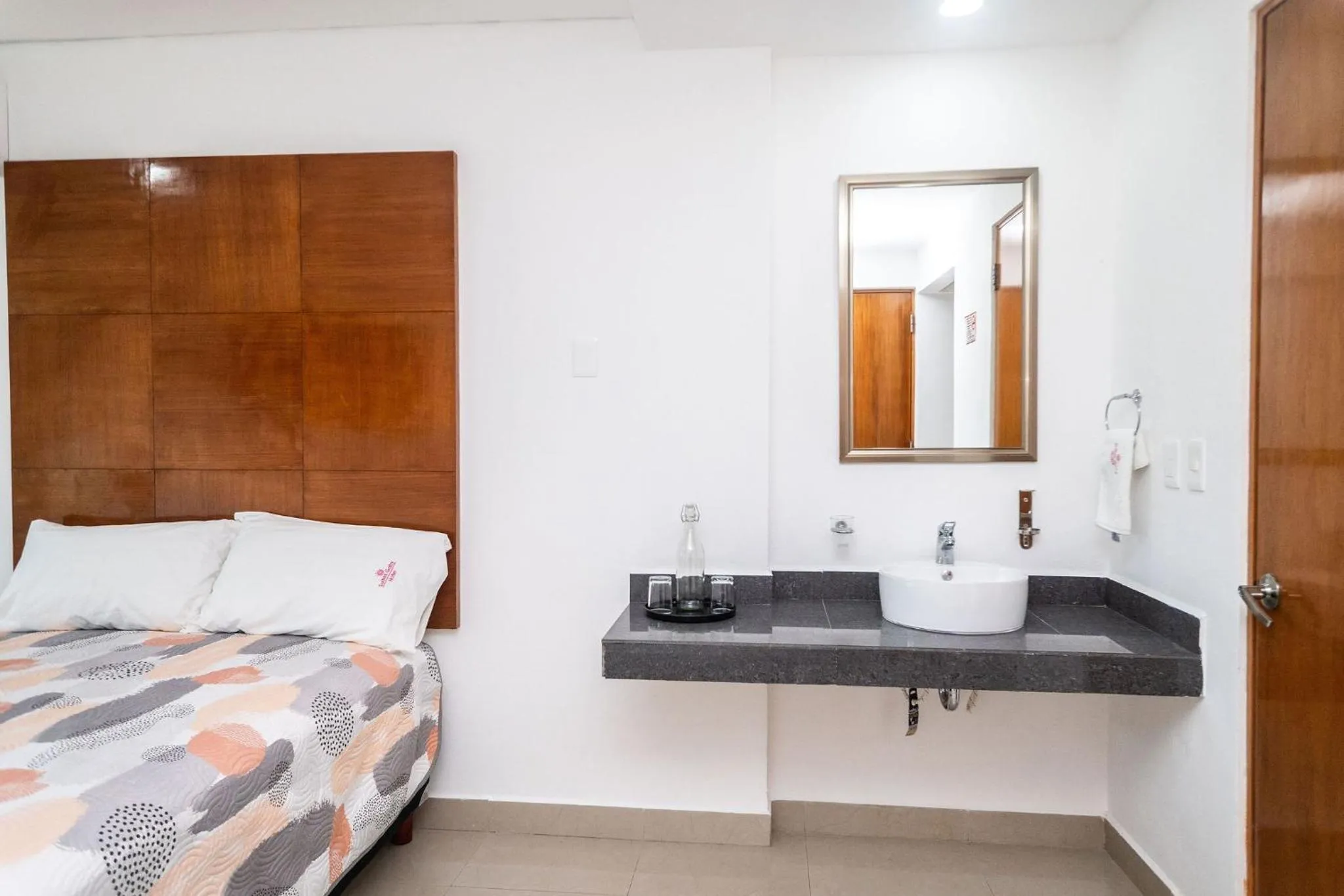 Bed in Hotel Suites Gaby