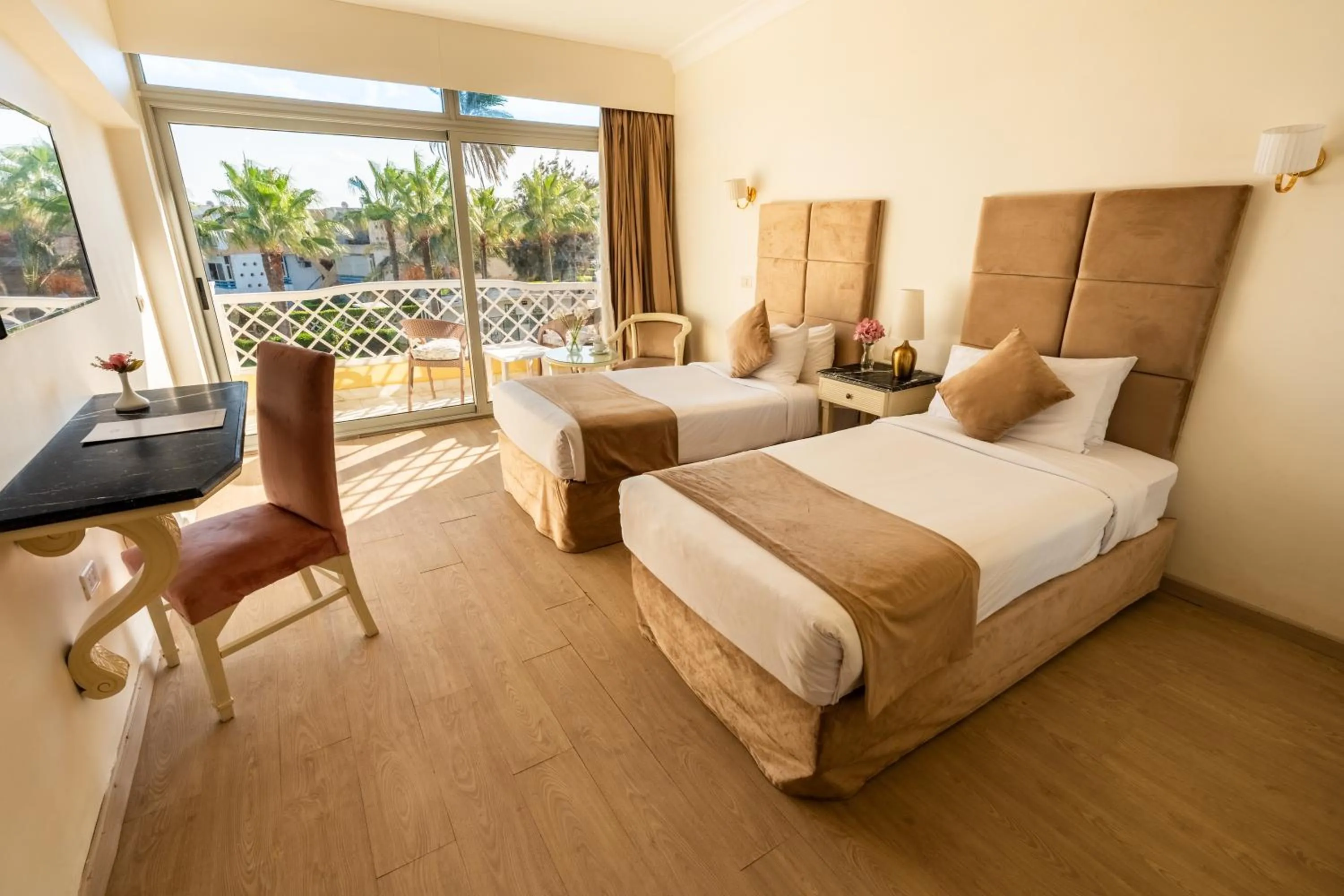 Photo of the whole room, Bed in Paradise Inn Beach Resort