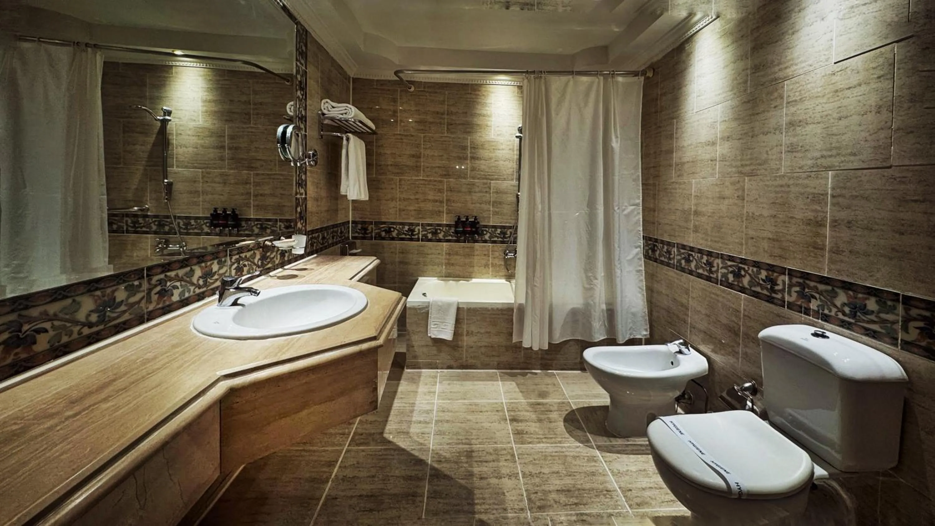 Toilet in Windsor Palace Luxury Heritage Hotel Since 1906 by Paradise Inn Group