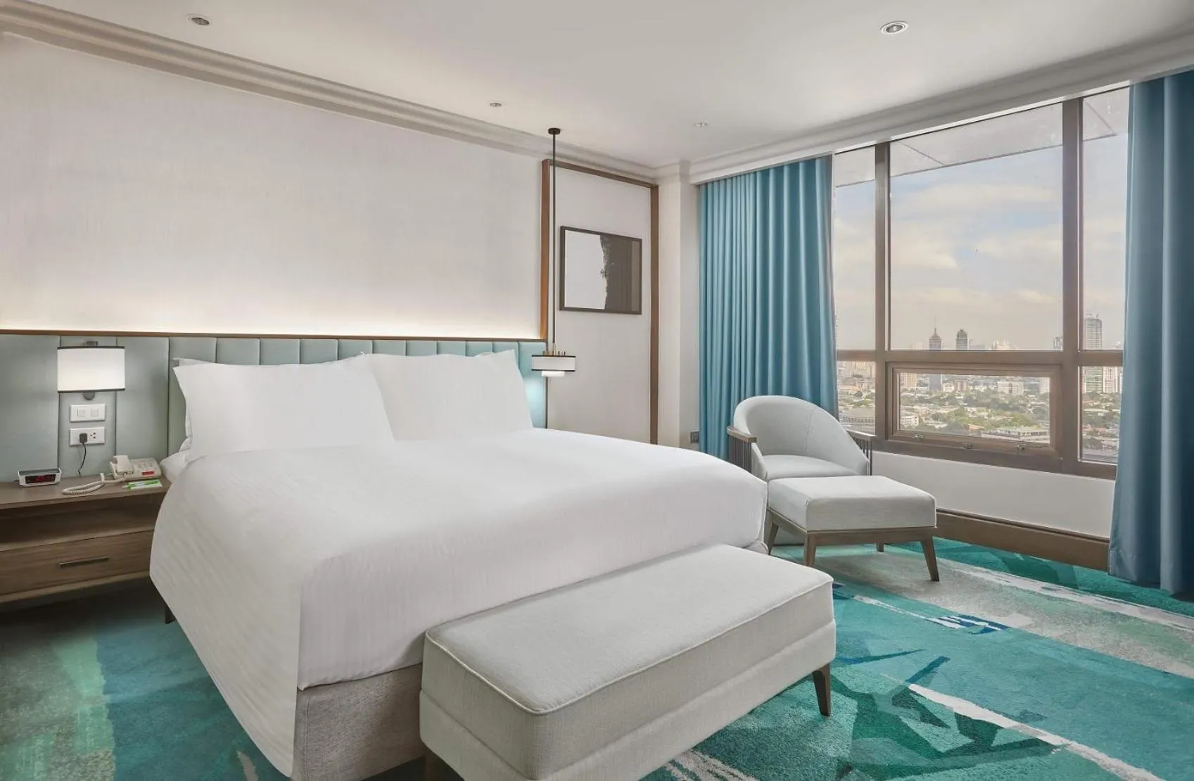 Bedroom, Bed in Holiday Inn & Suites Manila Galleria by IHG