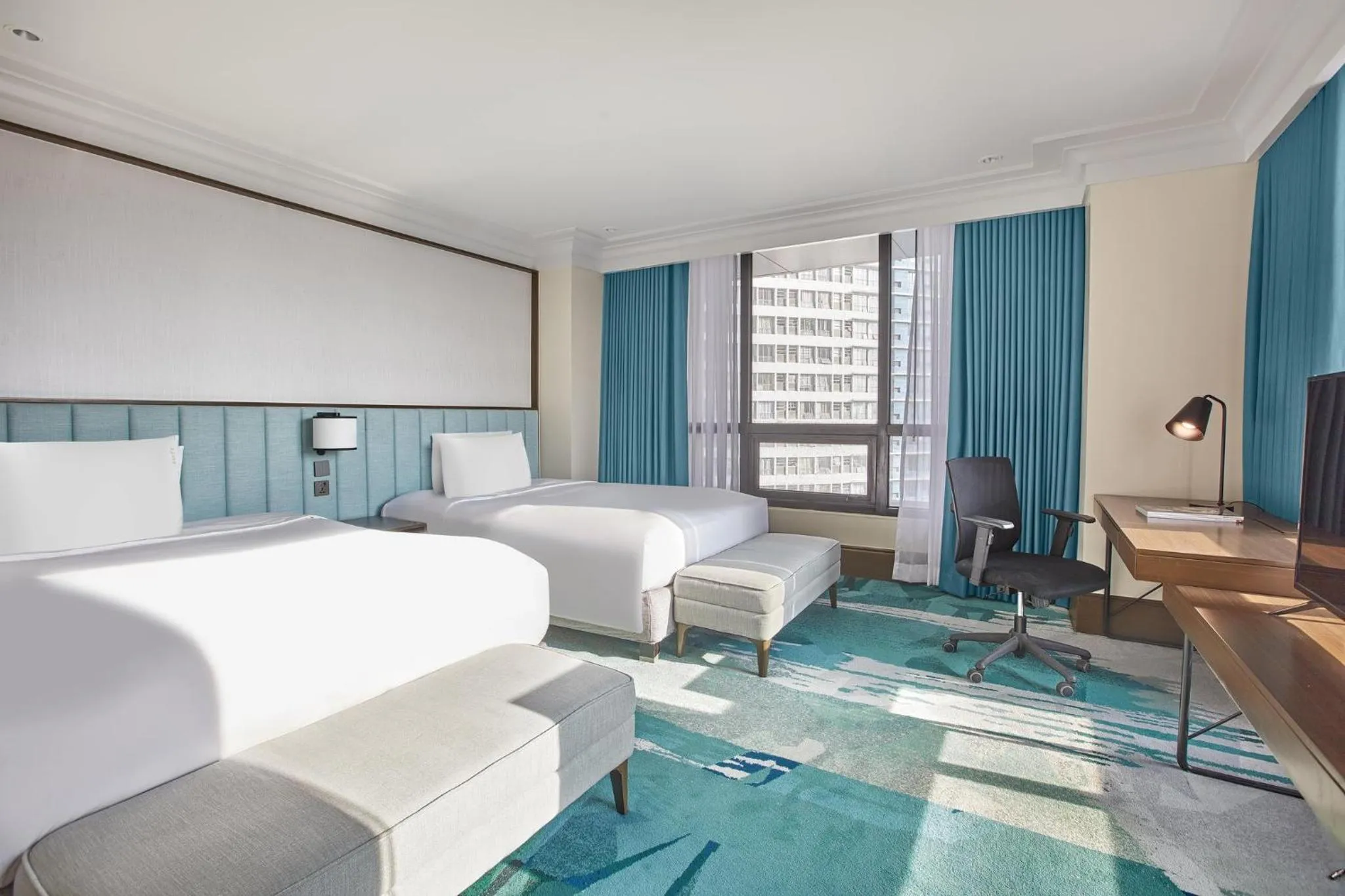 Photo of the whole room, Bed in Holiday Inn & Suites Manila Galleria by IHG