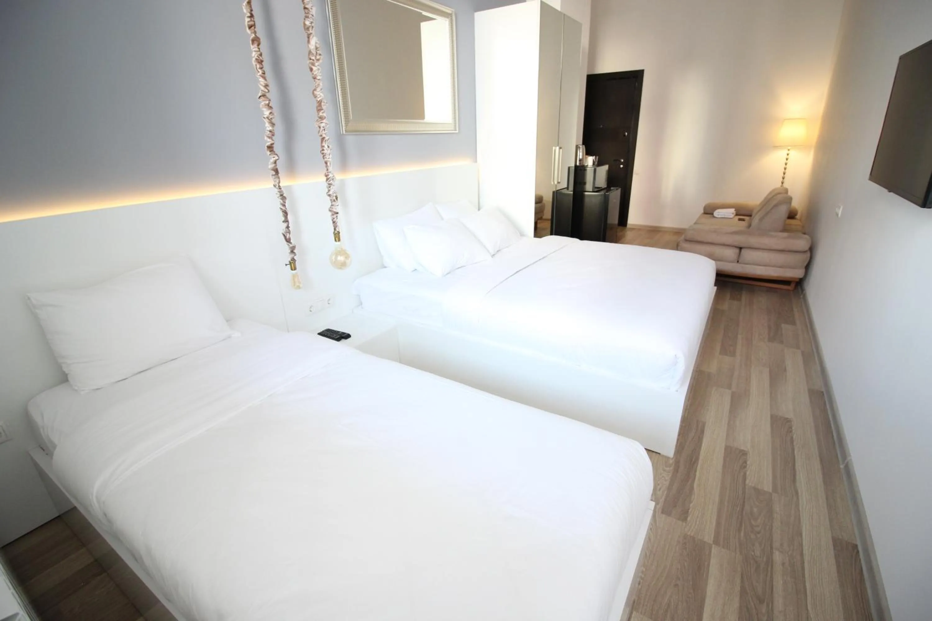 Living room, Bed in Maxela Apartments