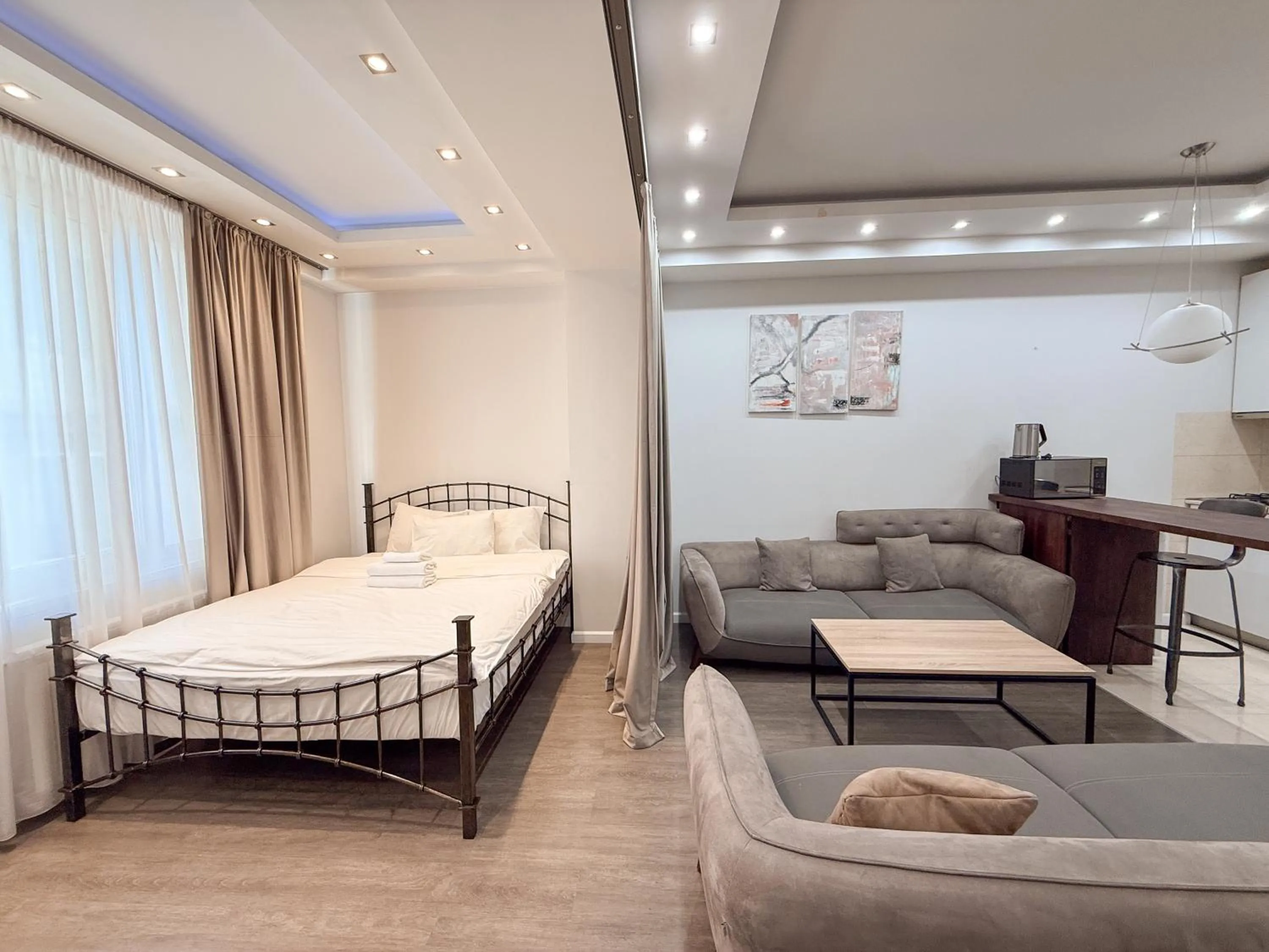 Bed in Maxela Apartments