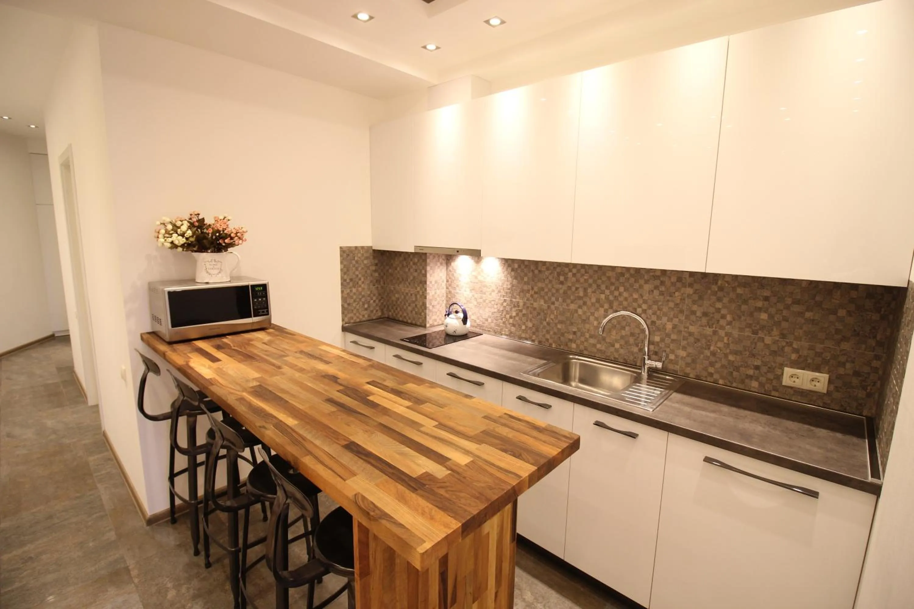 Kitchen or kitchenette in Maxela Apartments