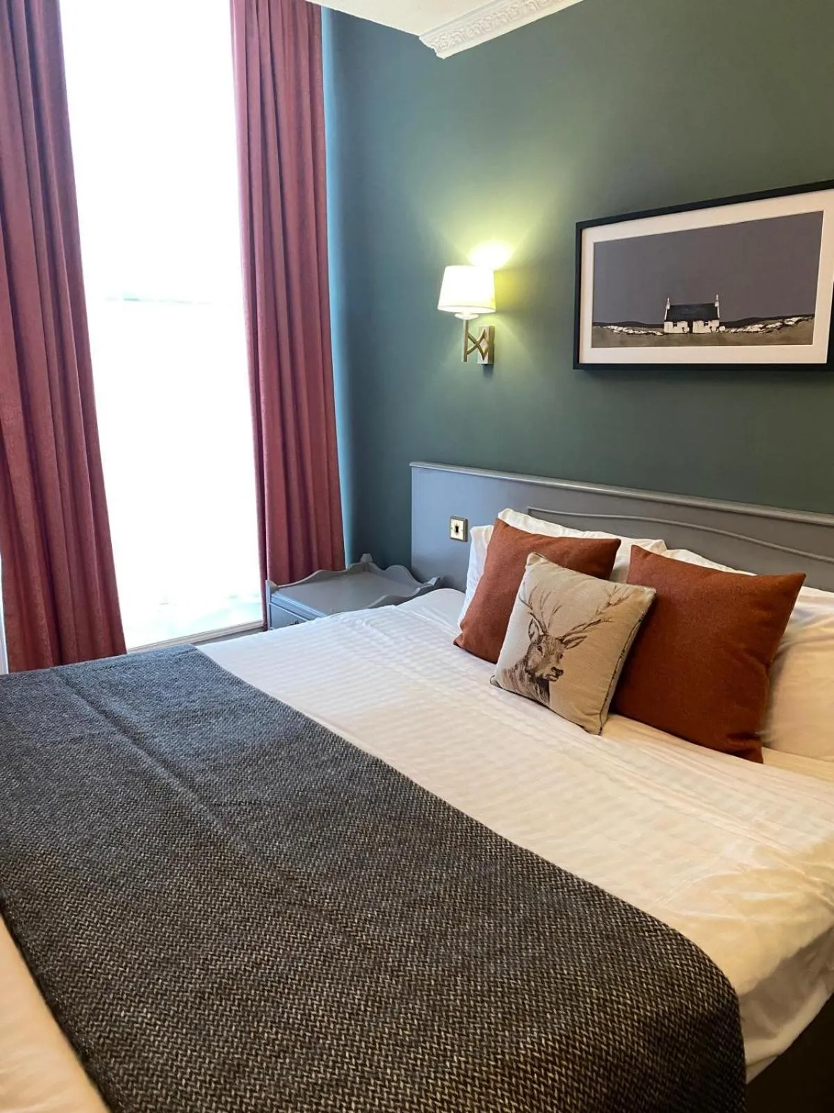 Bed in The Royal George Hotel