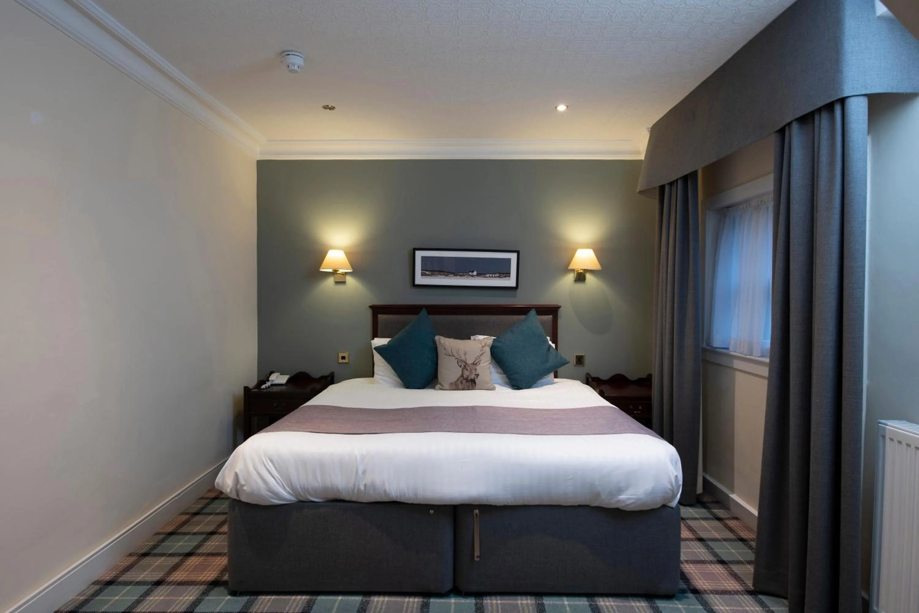 Bed in The Royal George Hotel