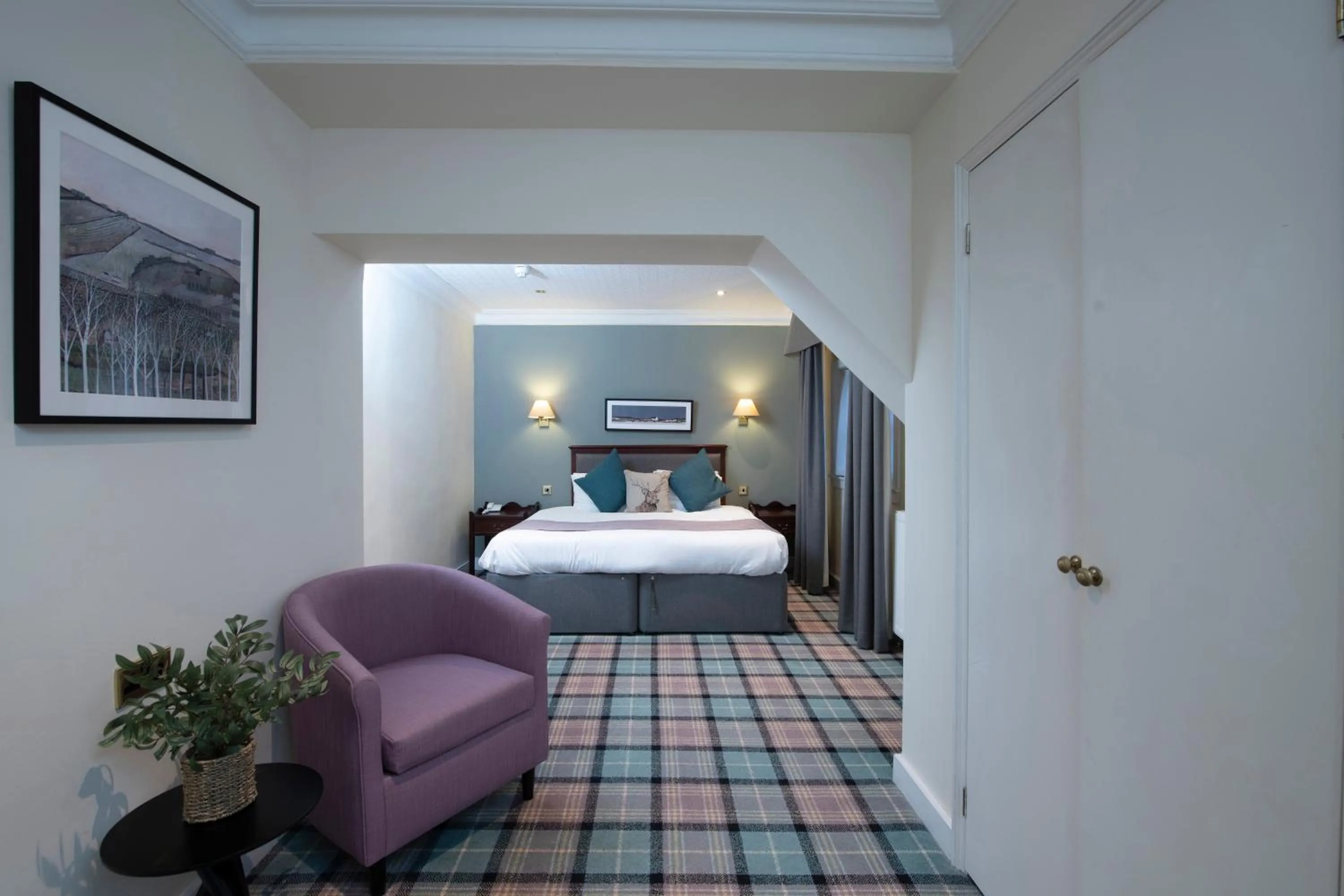 Bed in The Royal George Hotel