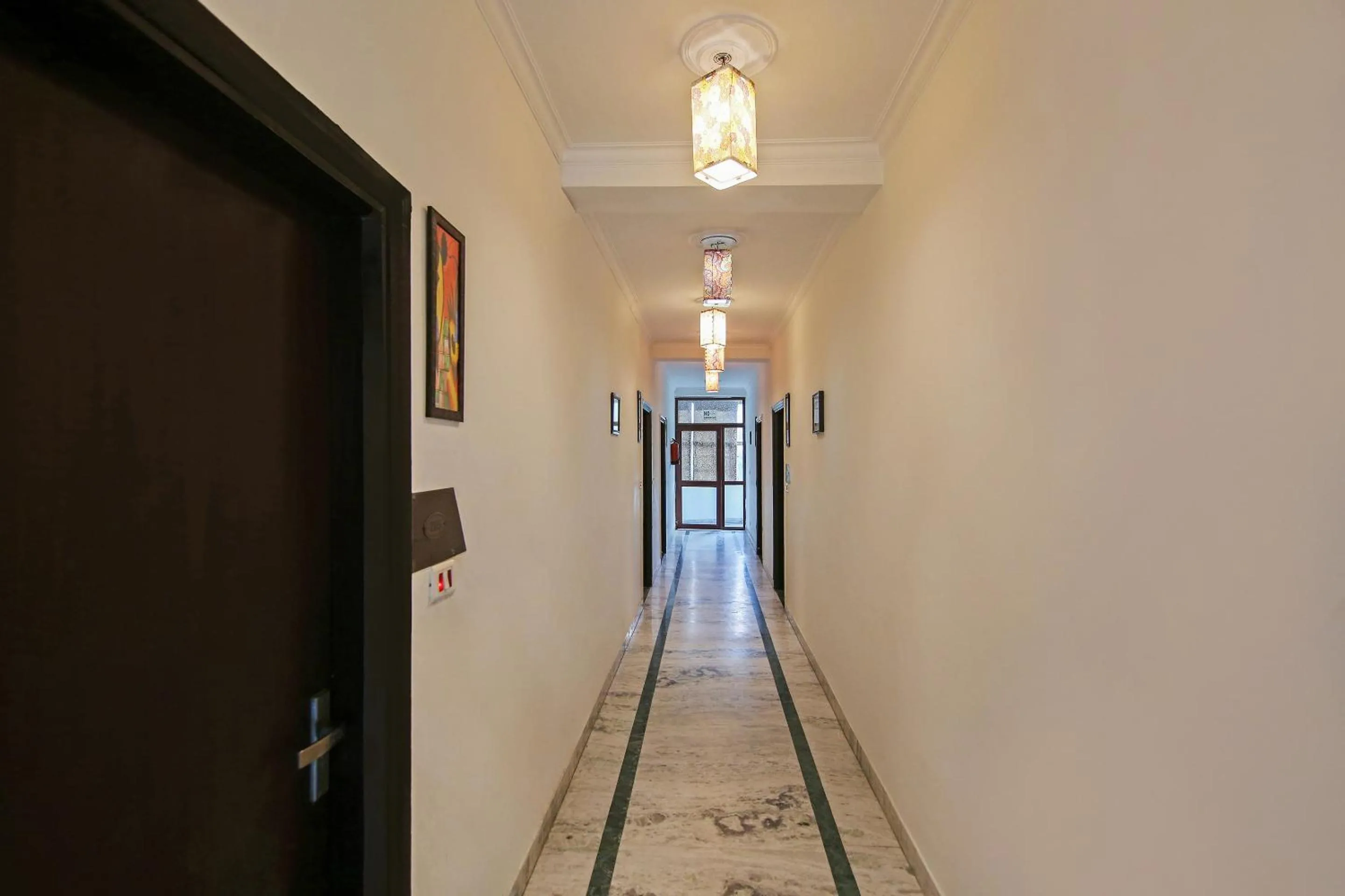 Lobby or reception in Capital O Tipsyy Near Aravali Biodiversity Park