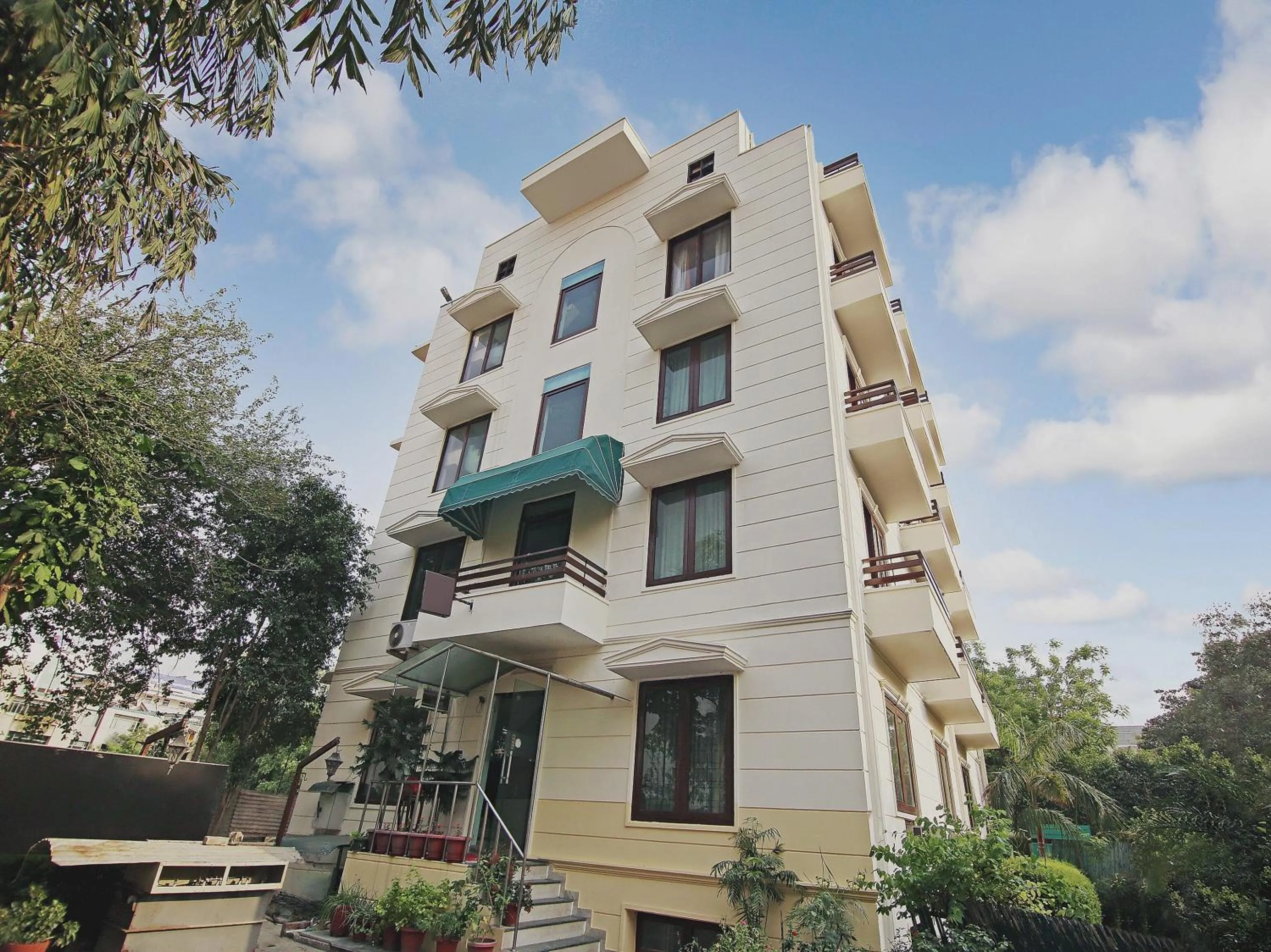 Facade/entrance in Capital O Tipsyy Near Aravali Biodiversity Park