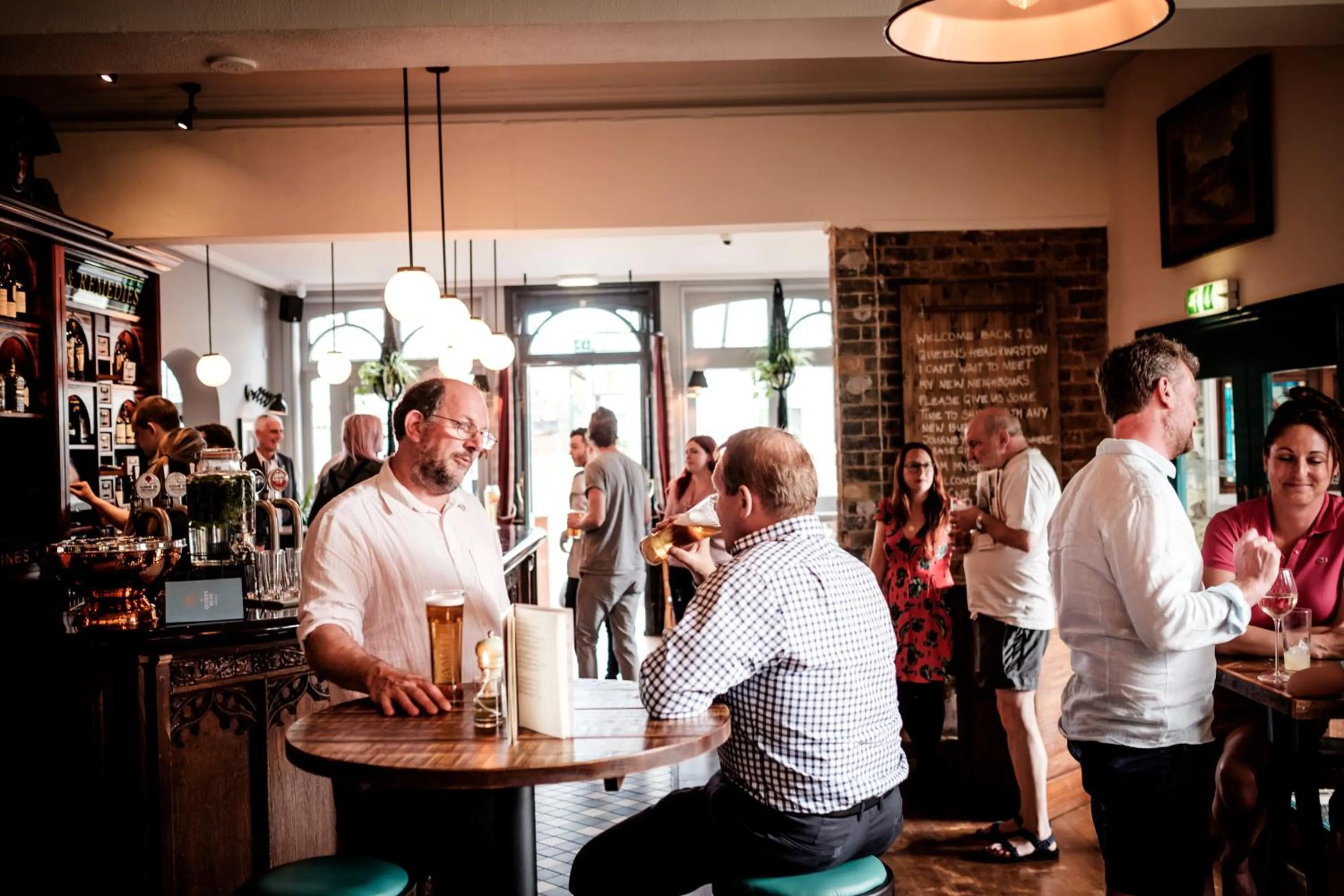 group of guests in The Queen's Head