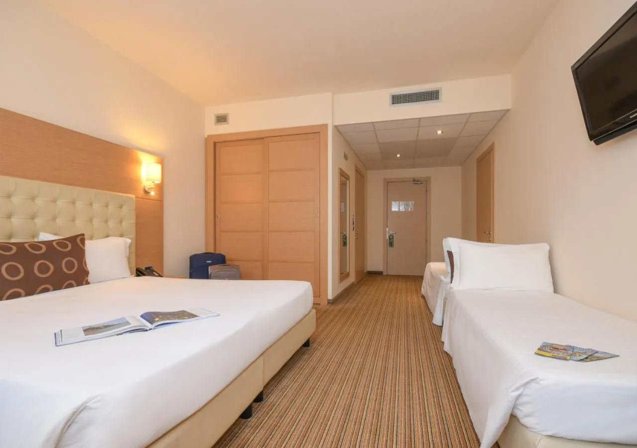 Photo of the whole room, Bed in TH Lazise - Hotel Parchi Del Garda