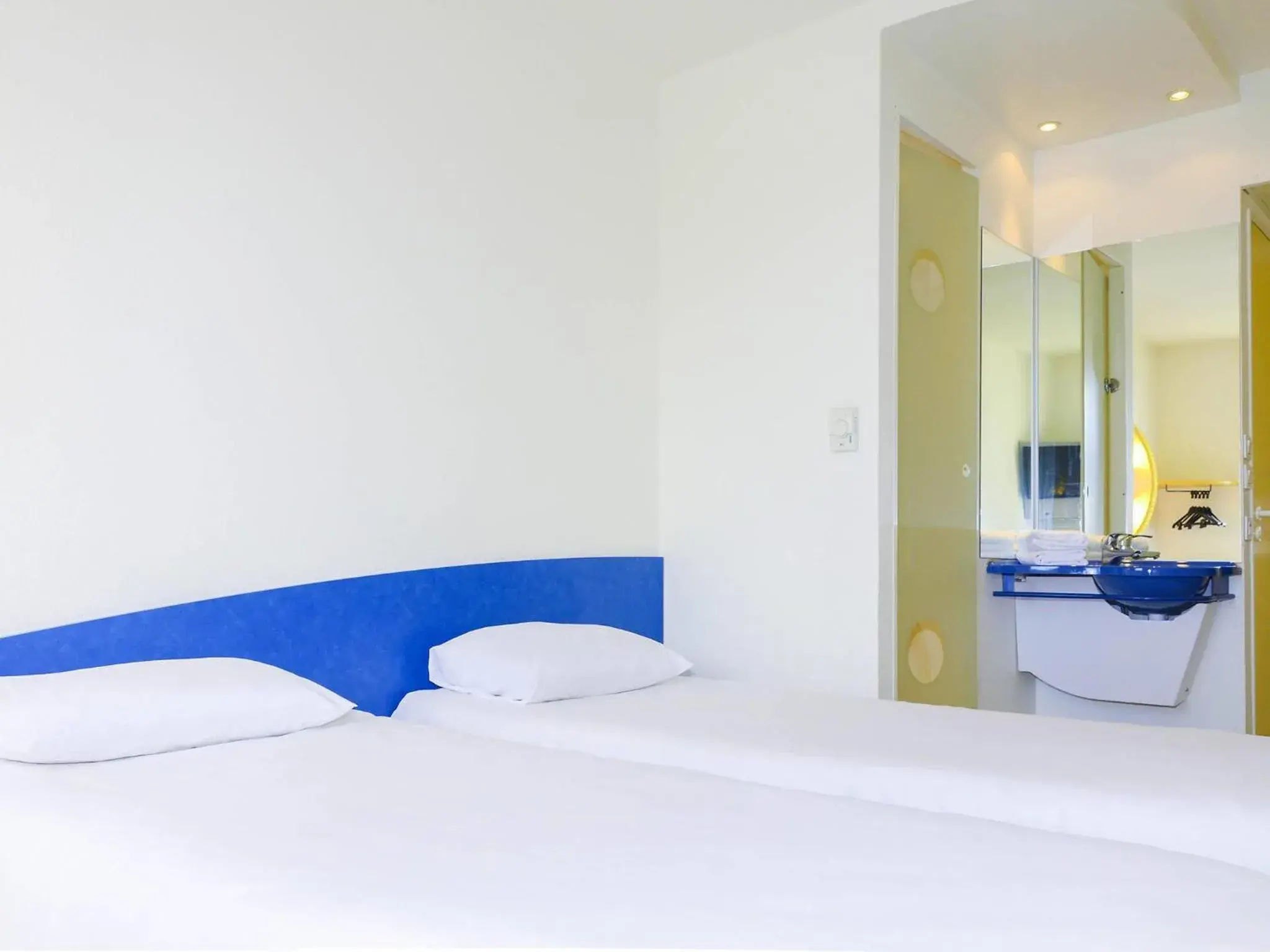 Bedroom, Bed in ibis budget Nevers Varennes Vauzelles Bedroom, Bed in ibis budget Nevers Varennes Vauzelles
