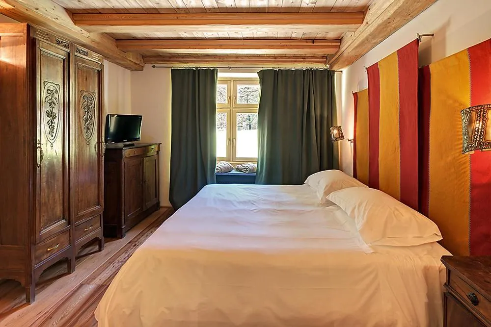 Bed in Saint Hubertus Resort