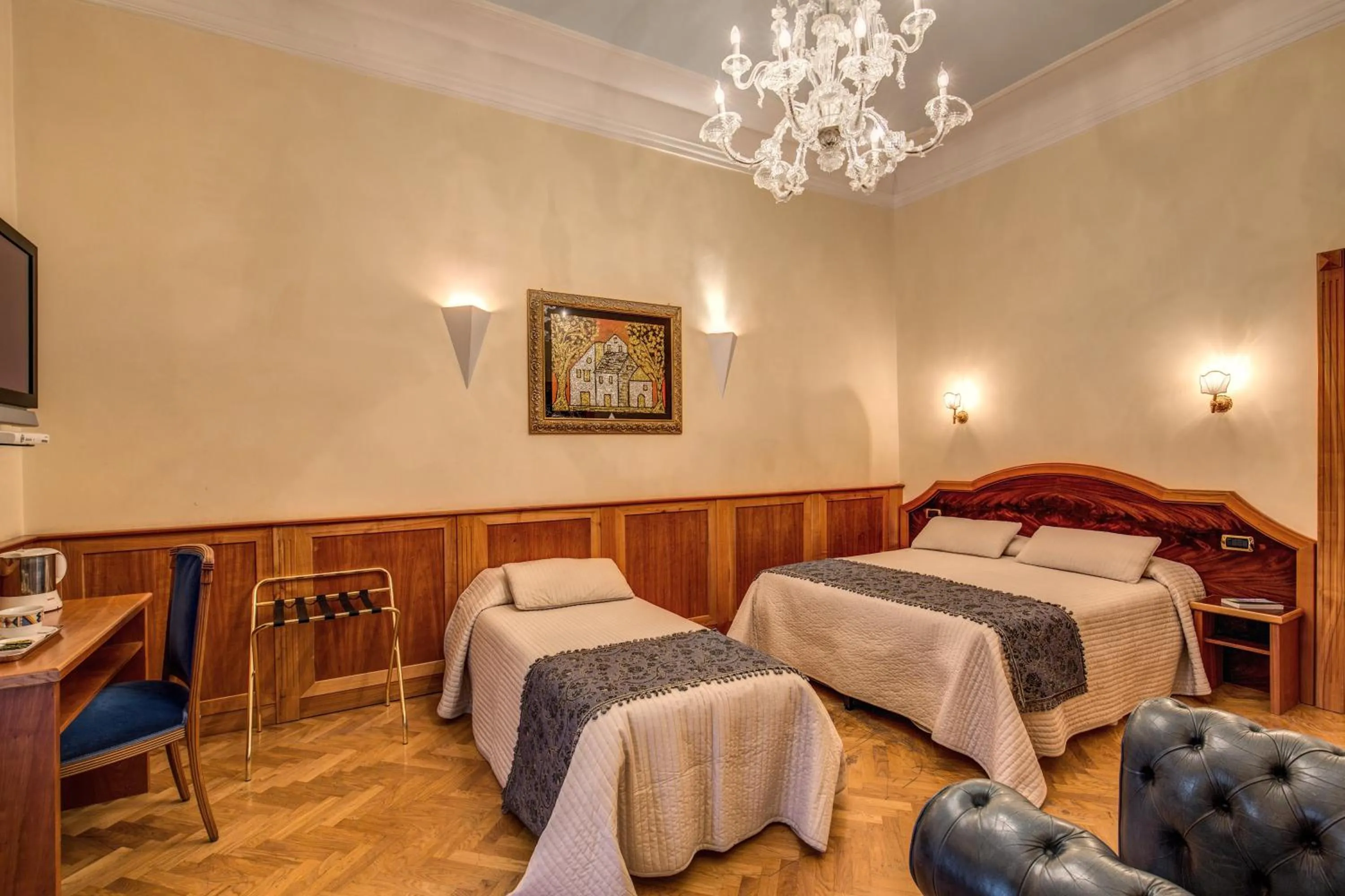 Bed in Relais Conte Di Cavour De Luxe
