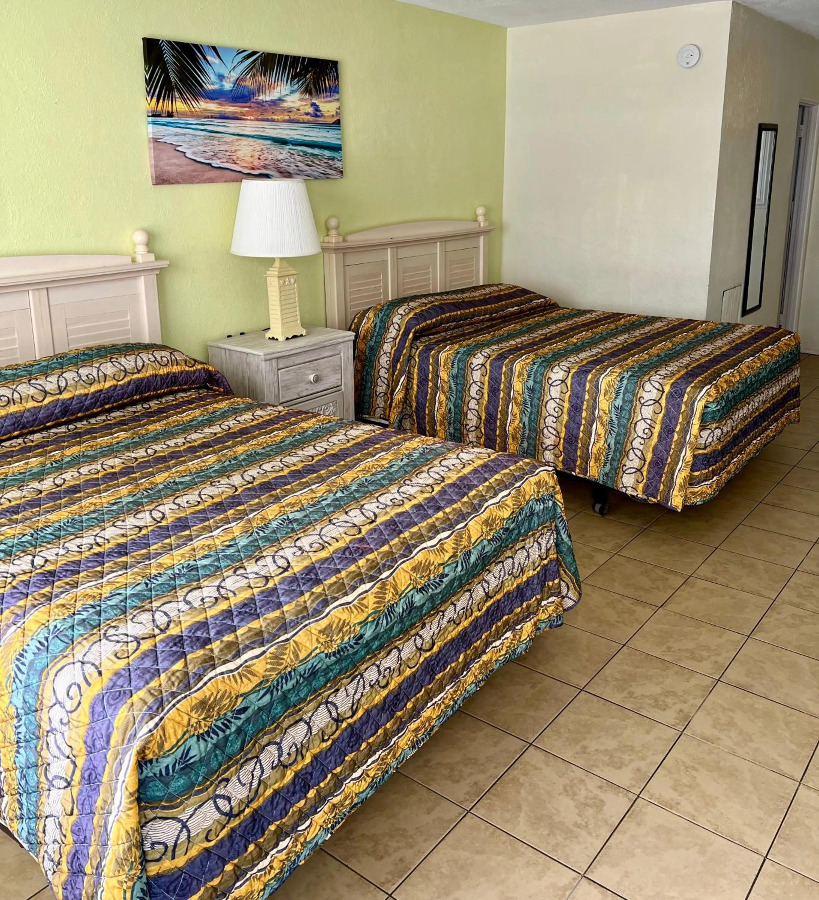 Bed in Beach Colony Motel