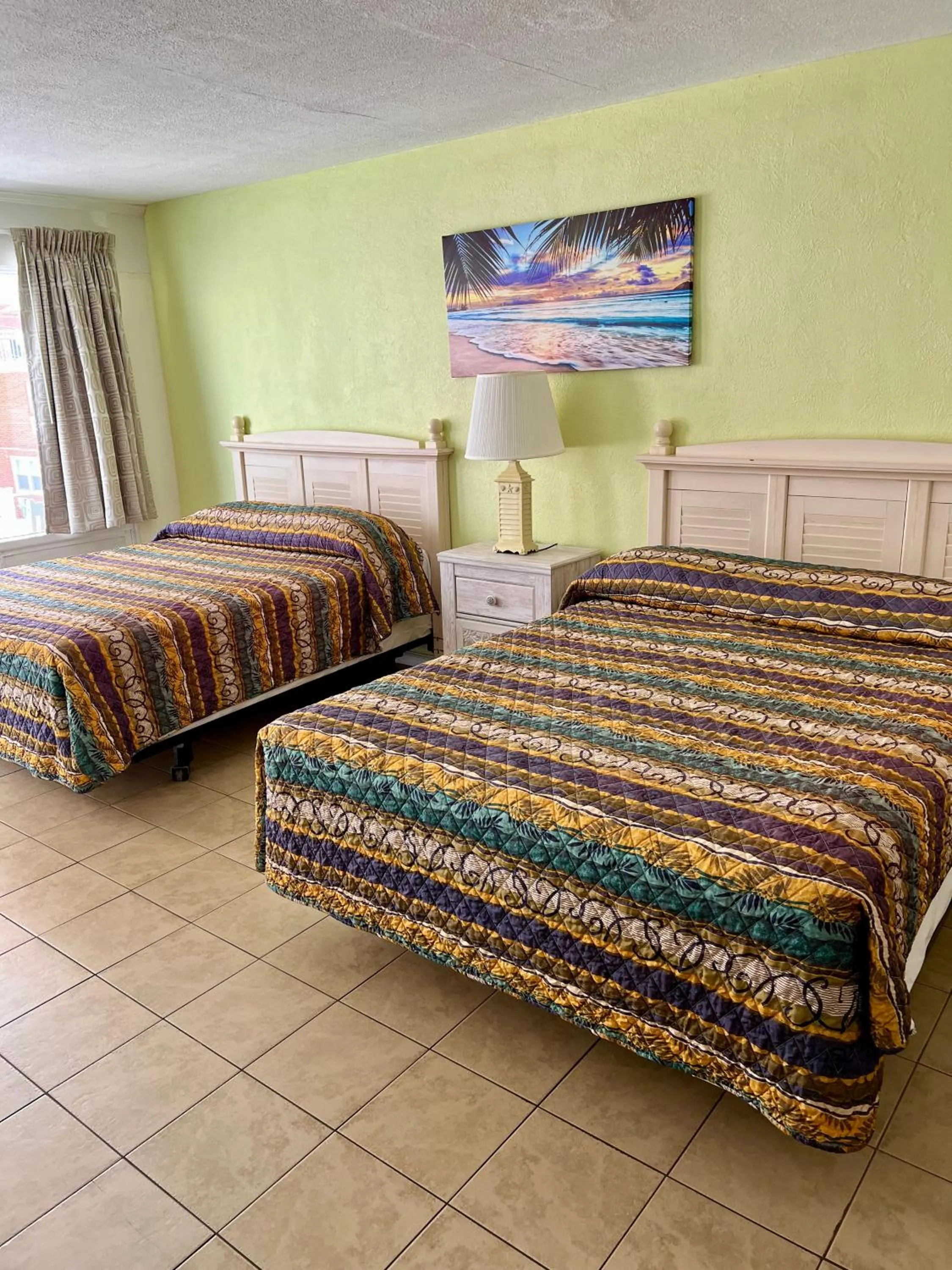 Bed in Beach Colony Motel