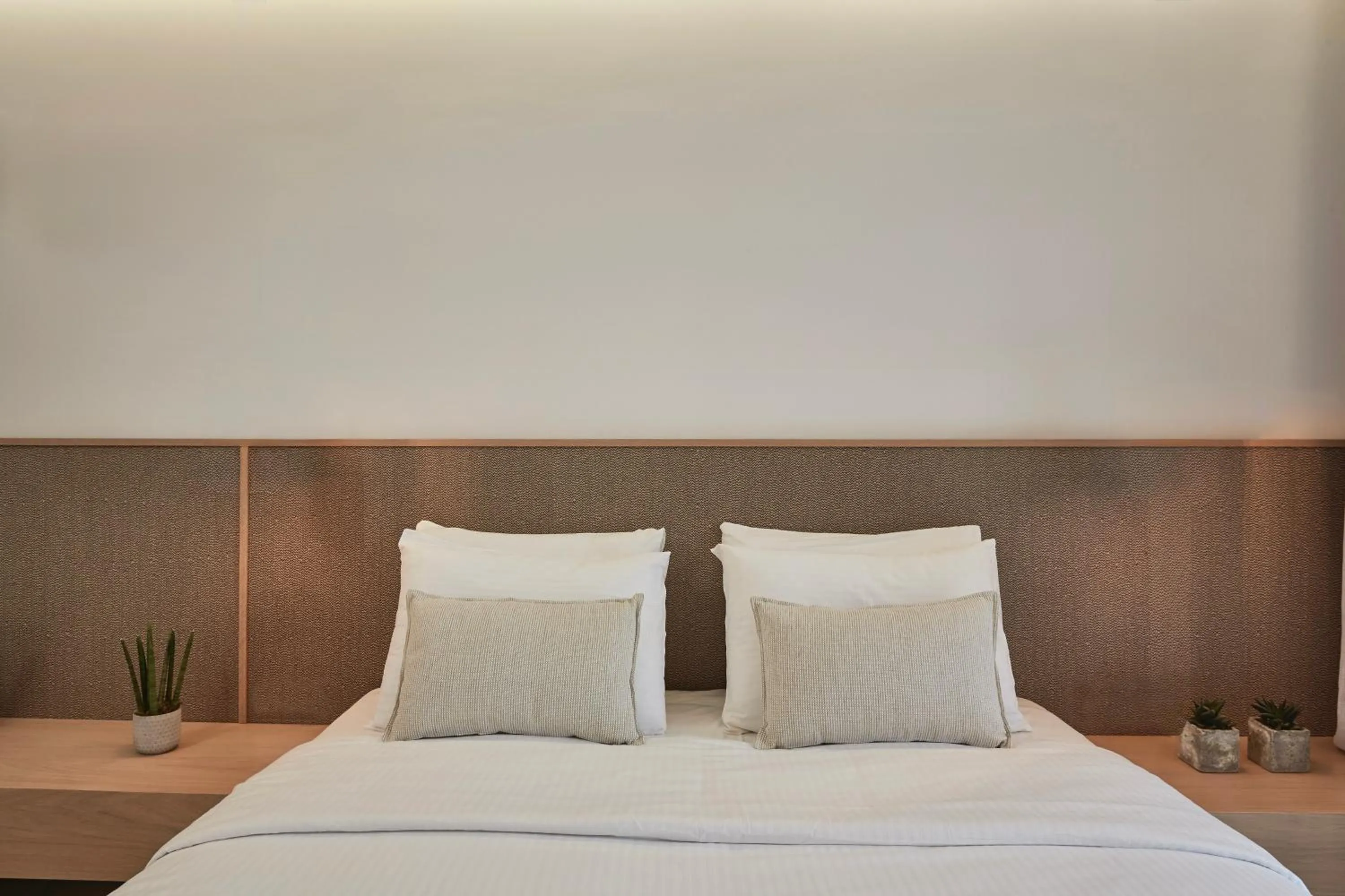 Bed in Mykonos Kosmoplaz Beach Resort Hotel