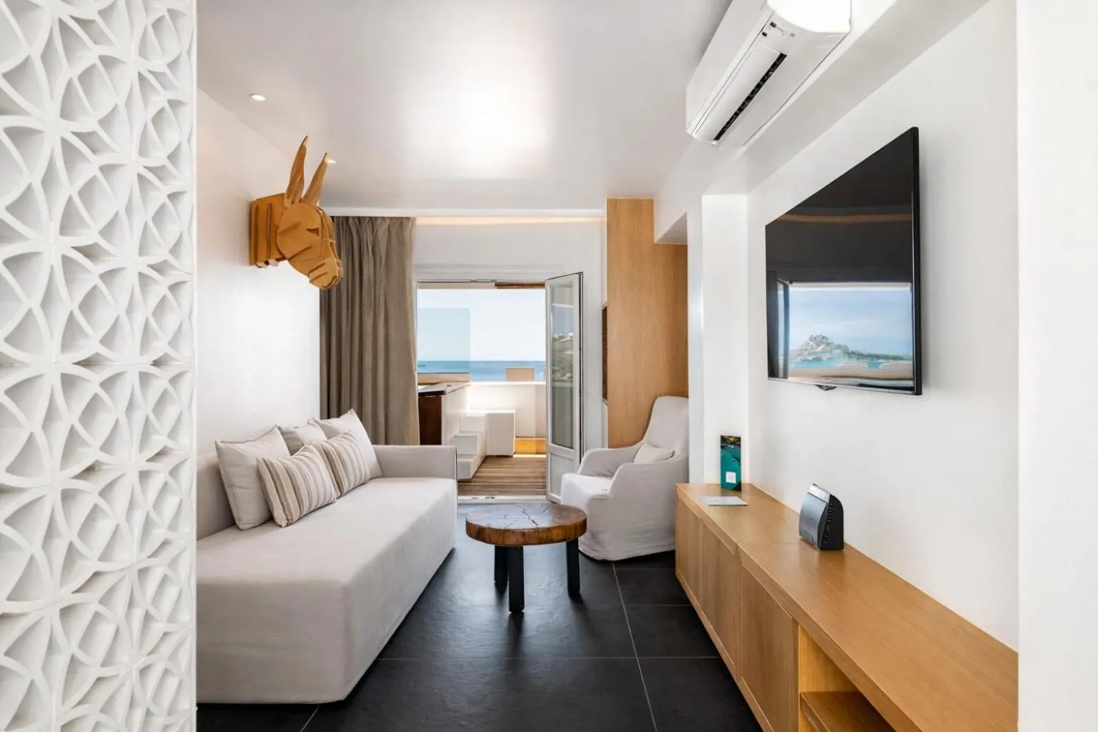 Bed in Mykonos Kosmoplaz Beach Resort Hotel