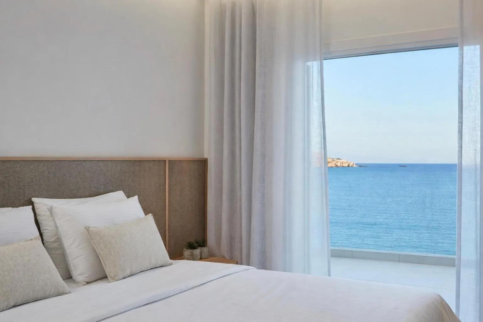 Bed in Mykonos Kosmoplaz Beach Resort Hotel
