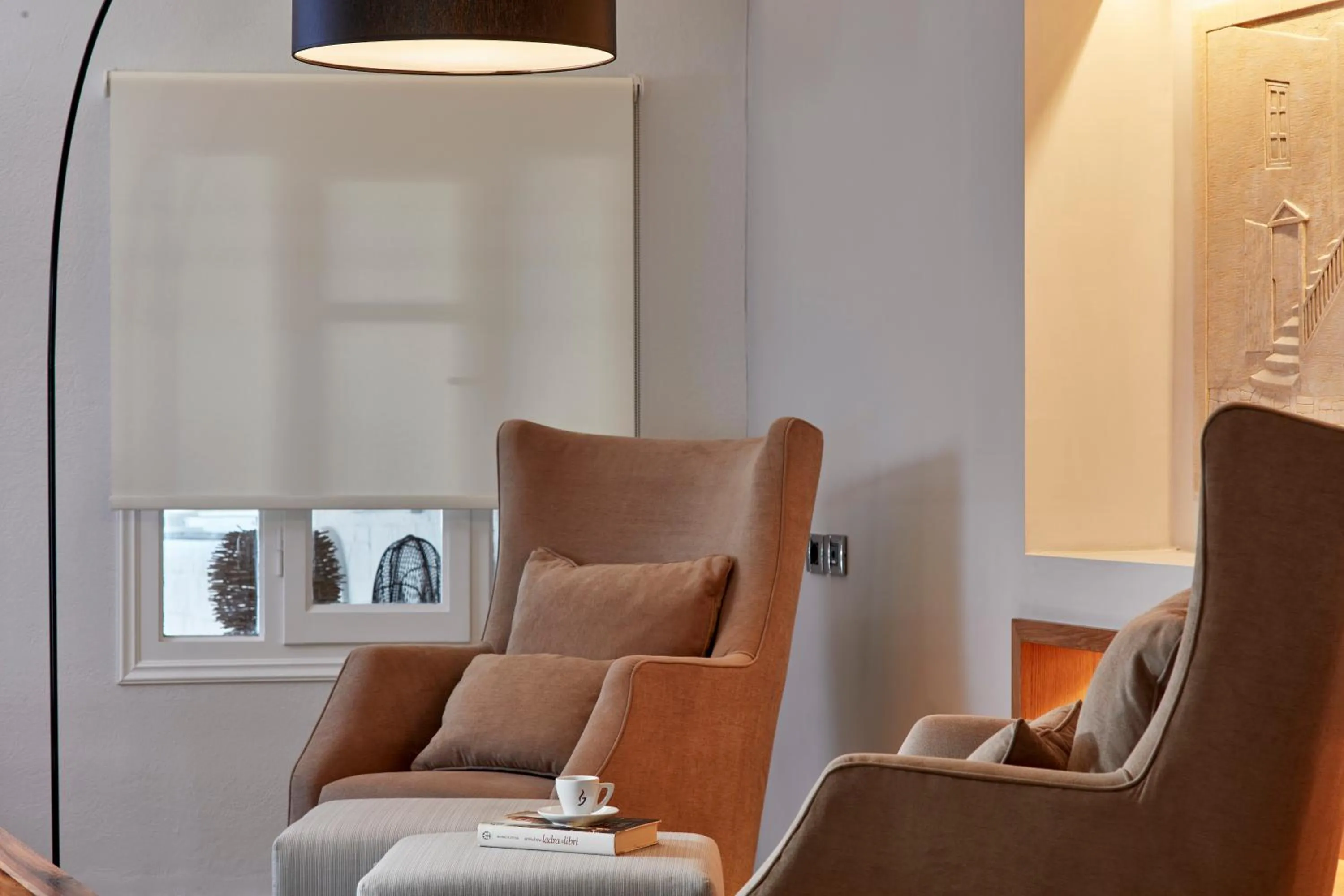 Library in Mykonos Kosmoplaz Beach Resort Hotel