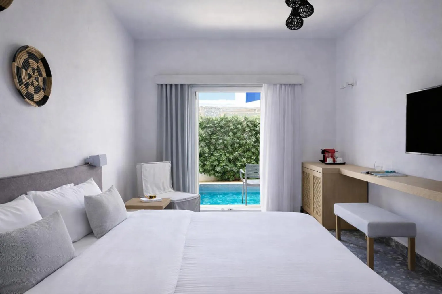 Bed in Mykonos Kosmoplaz Beach Resort Hotel