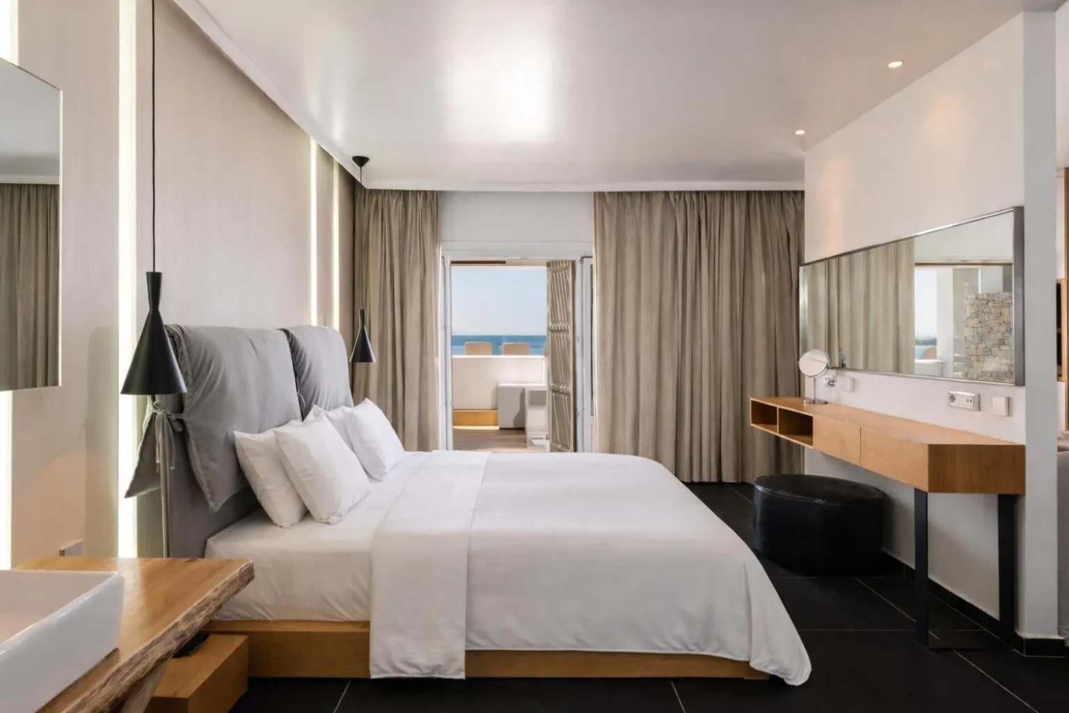 Bed in Mykonos Kosmoplaz Beach Resort Hotel