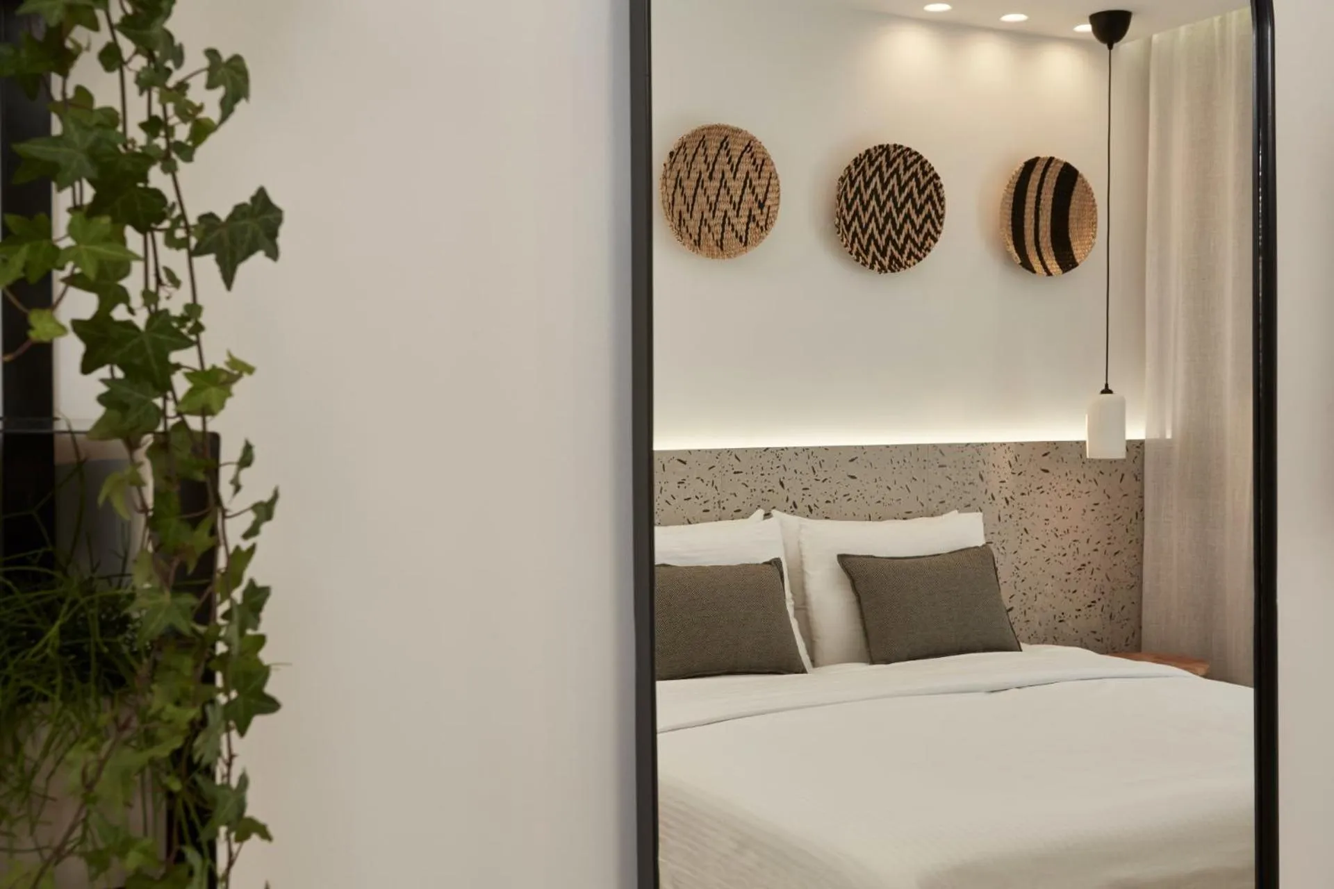 Bed in Mykonos Kosmoplaz Beach Resort Hotel