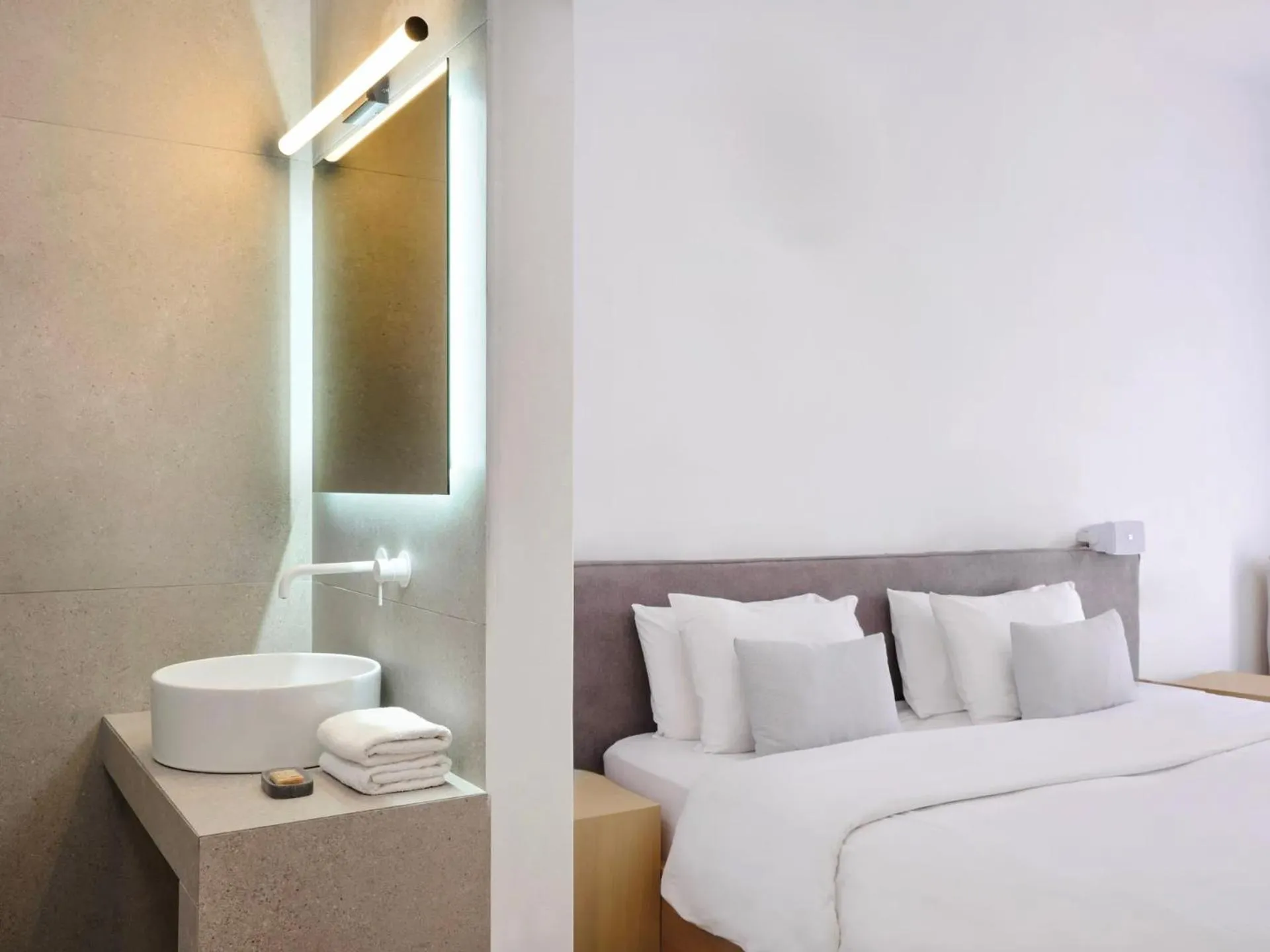 Bed in Mykonos Kosmoplaz Beach Resort Hotel