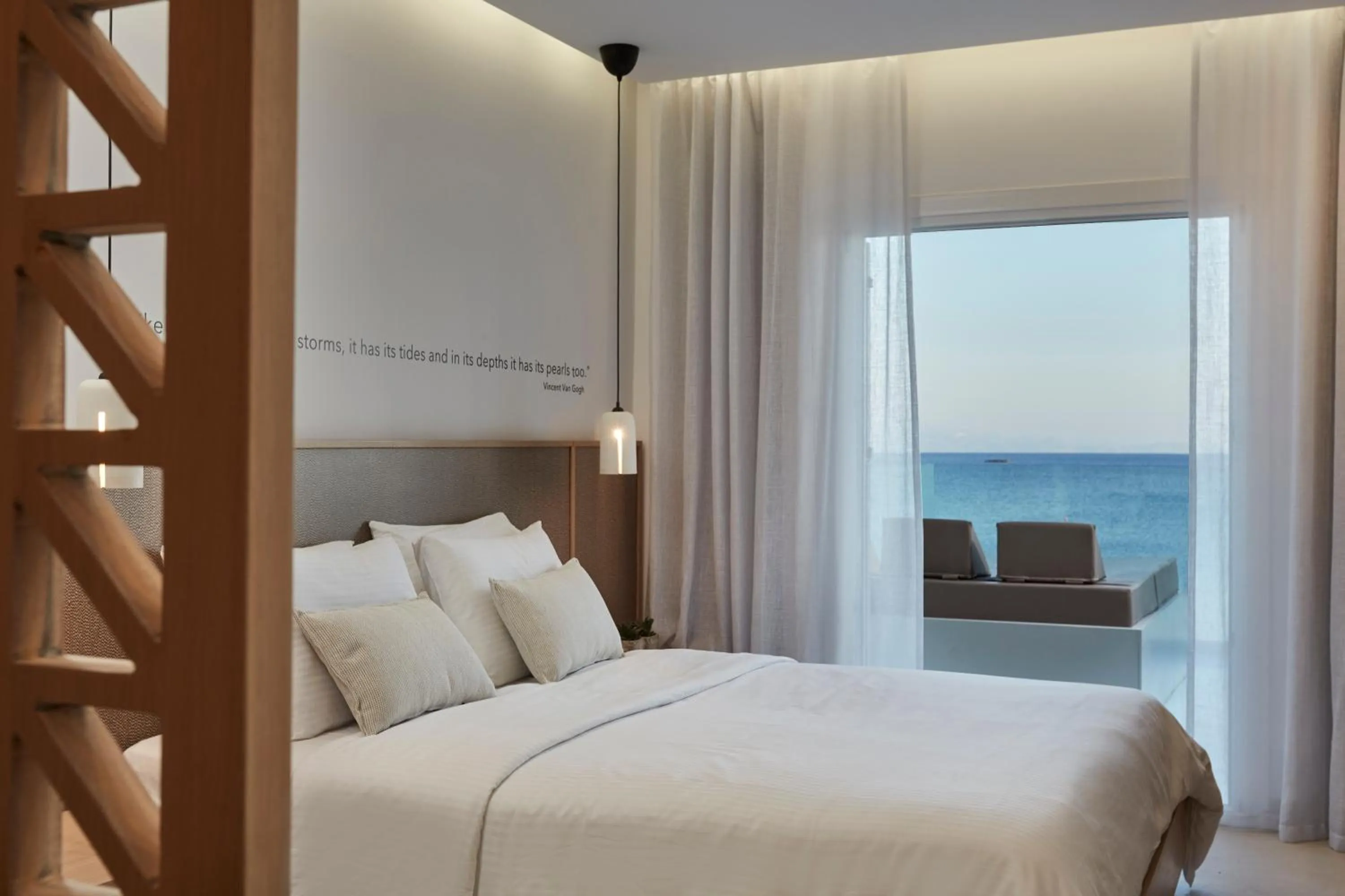 Bed in Mykonos Kosmoplaz Beach Resort Hotel