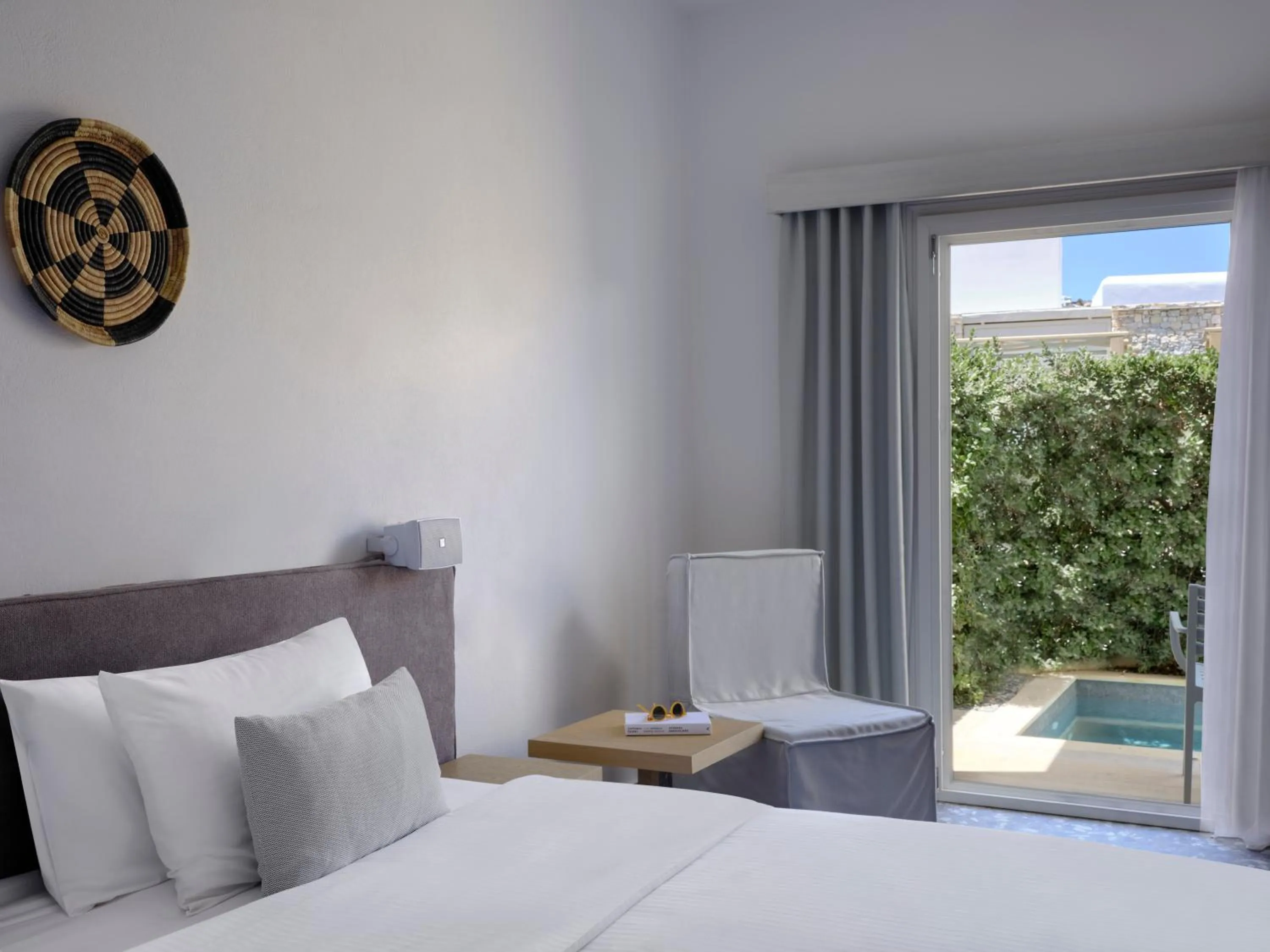 Bed in Mykonos Kosmoplaz Beach Resort Hotel