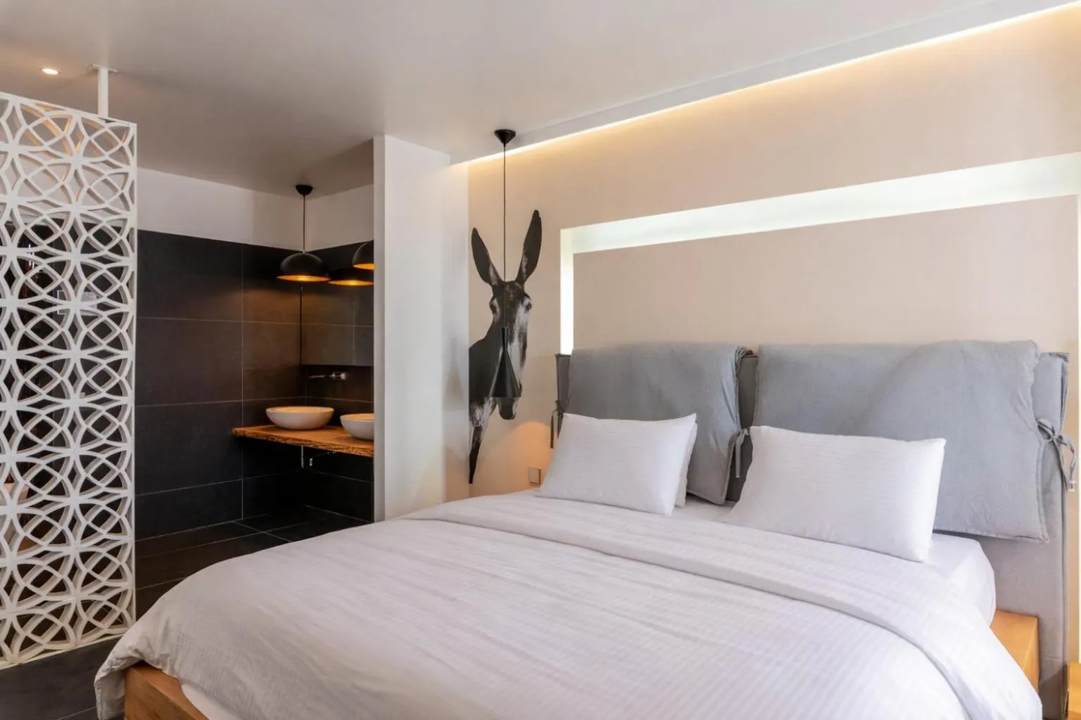 Bed in Mykonos Kosmoplaz Beach Resort Hotel