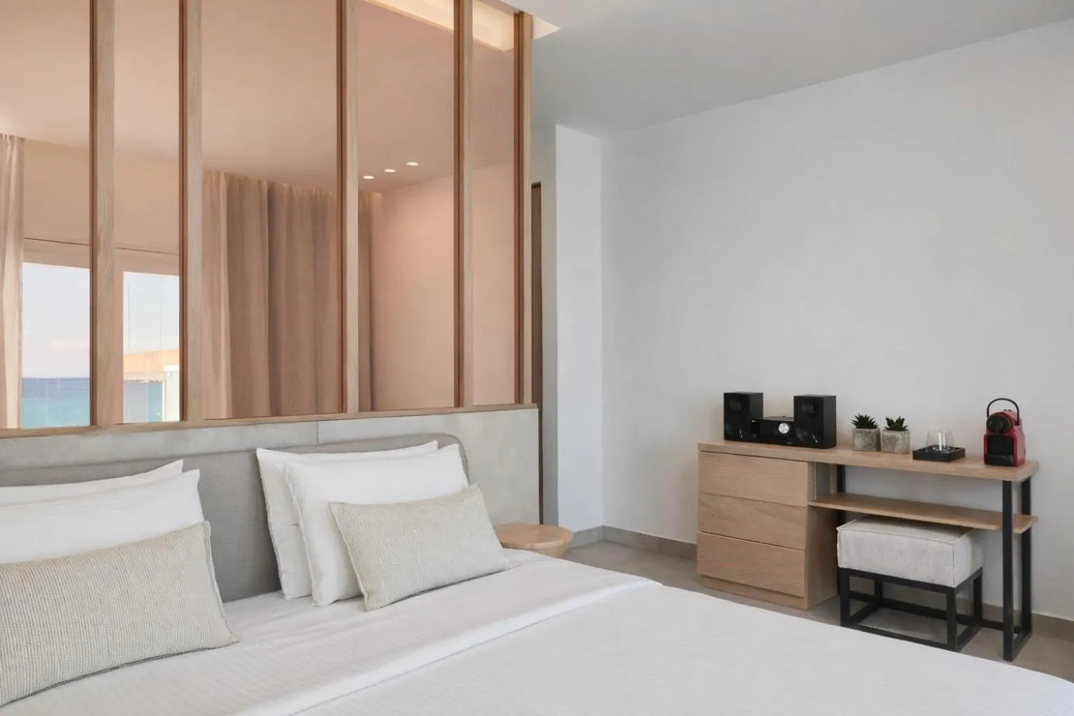 Bed in Mykonos Kosmoplaz Beach Resort Hotel