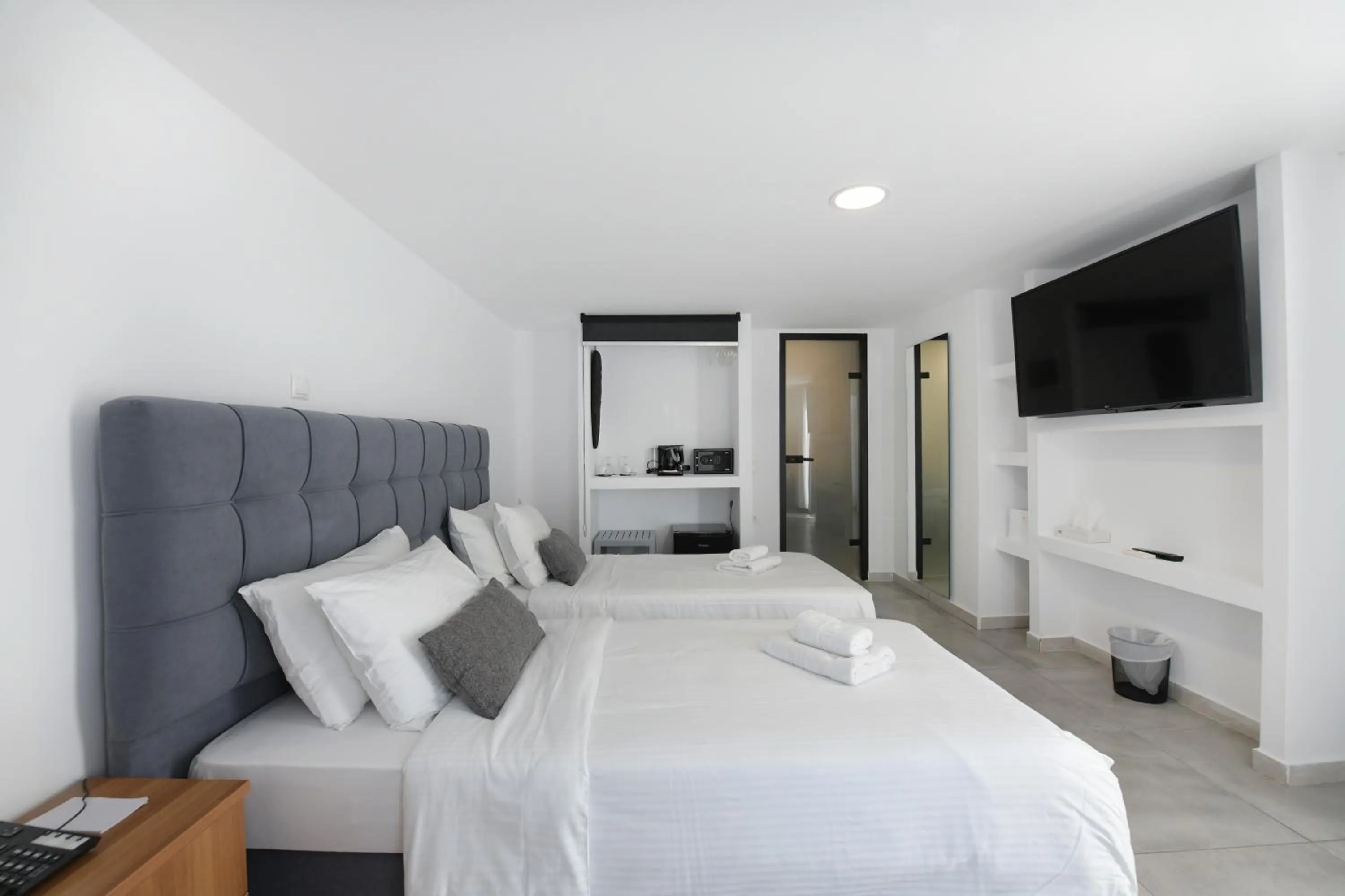 Bed in Mykonos Kosmoplaz Beach Resort Hotel