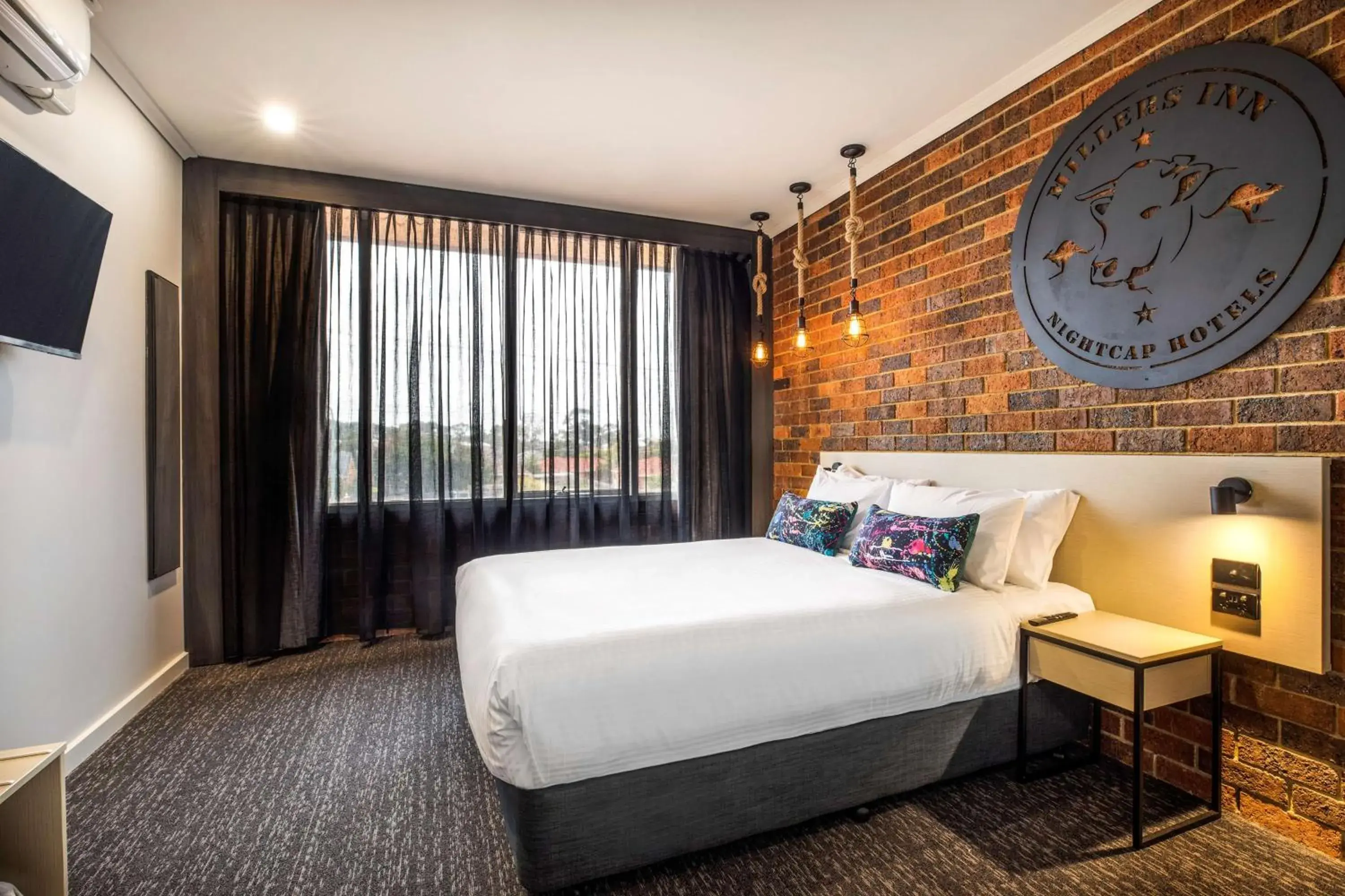 Bedroom, Bed in Nightcap at Millers Inn Bedroom, Bed in Nightcap at Millers Inn