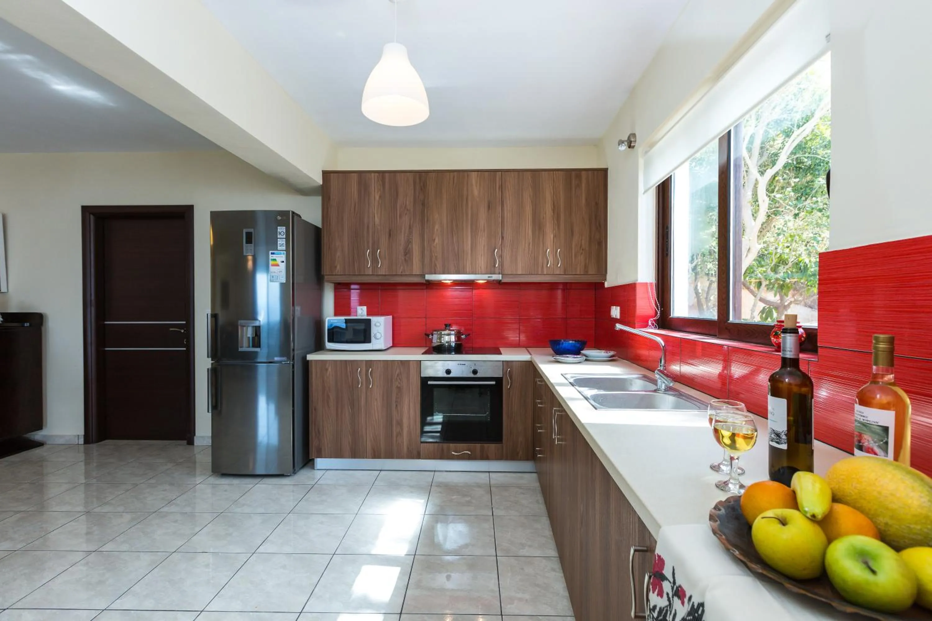 Kitchen or kitchenette in Kalathas Sunset Villa
