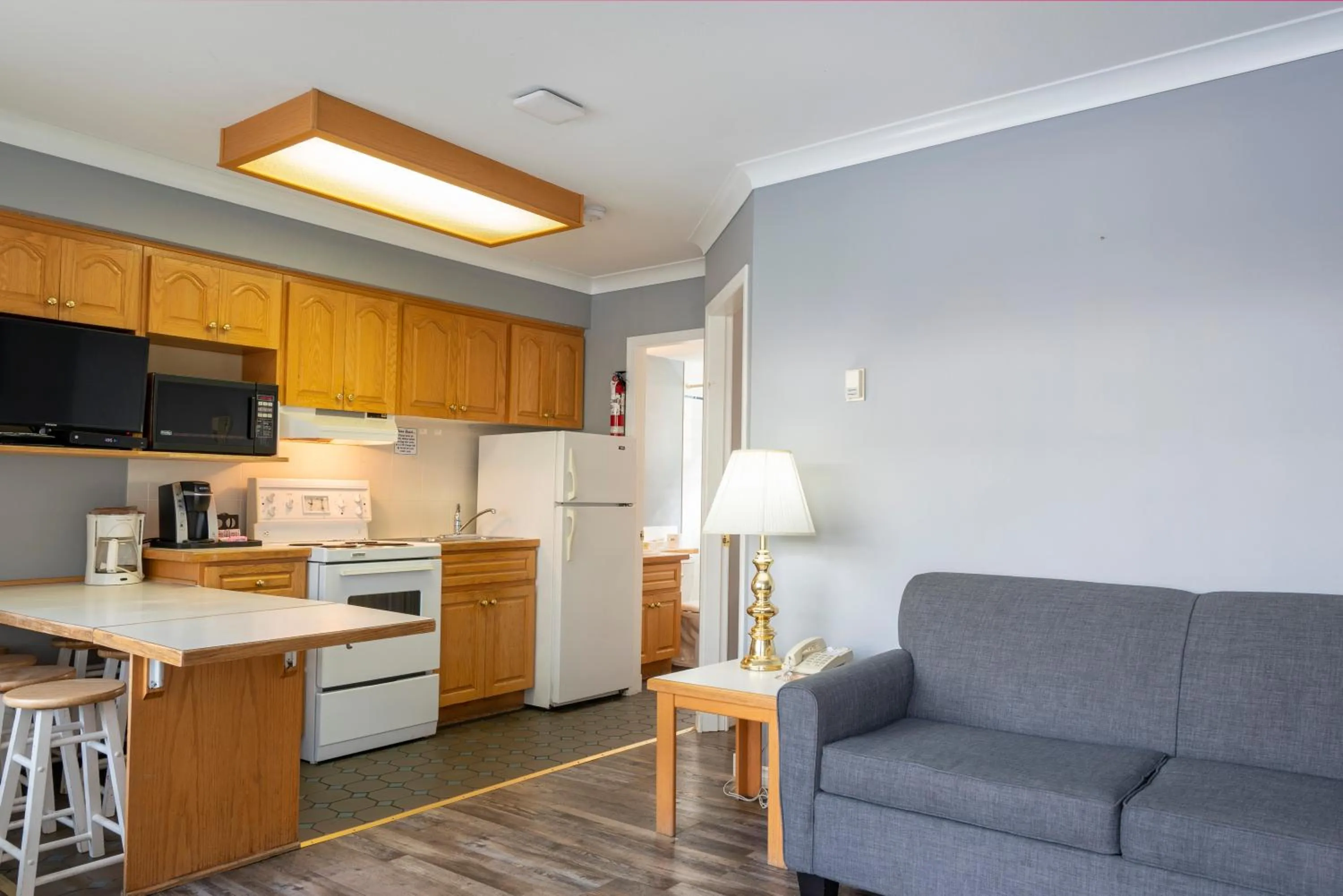 Kitchen or kitchenette in Tiki Shores Inn & Suites