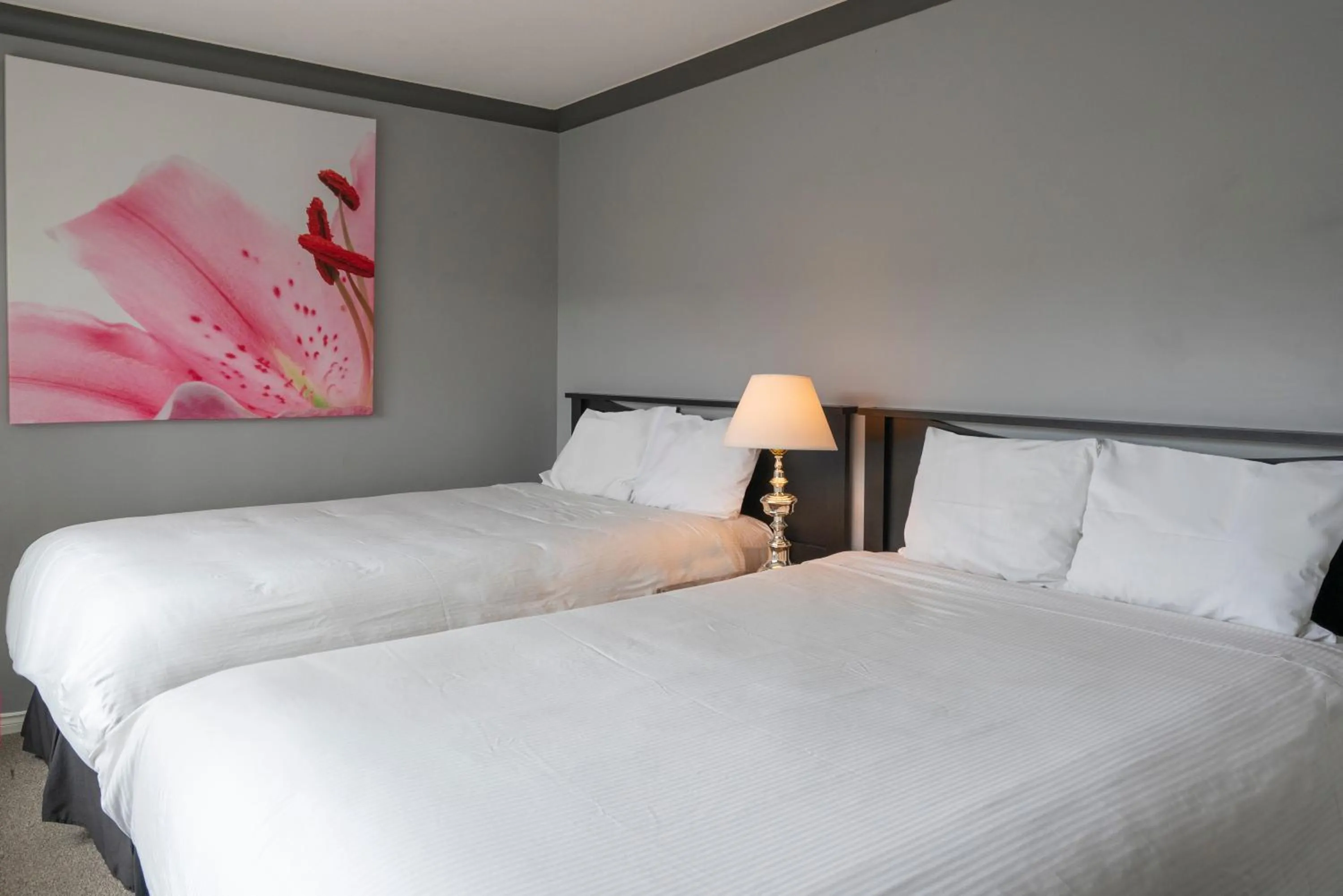 Bedroom, Bed in Tiki Shores Inn & Suites