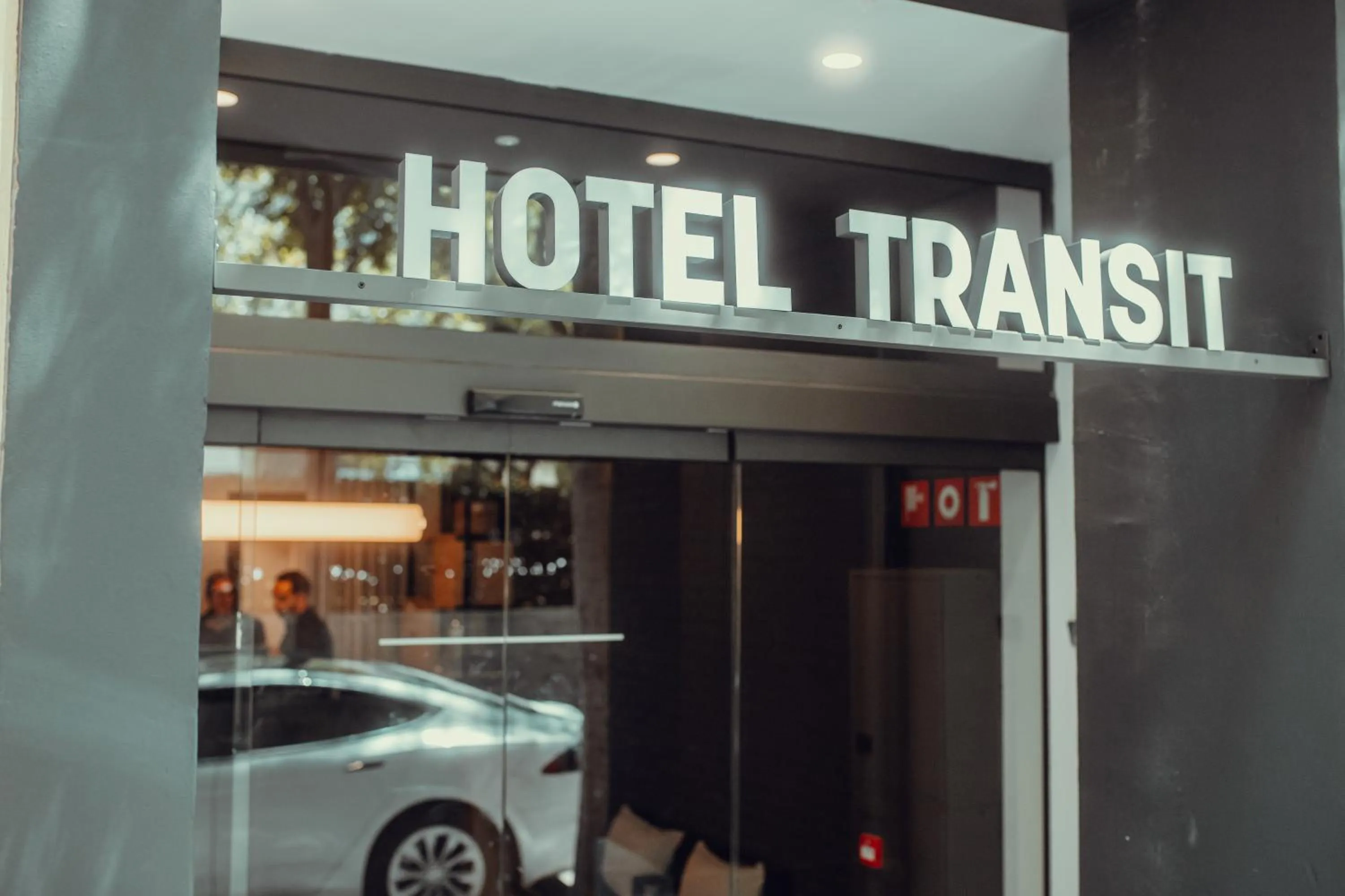 Property logo or sign in Hotel Transit