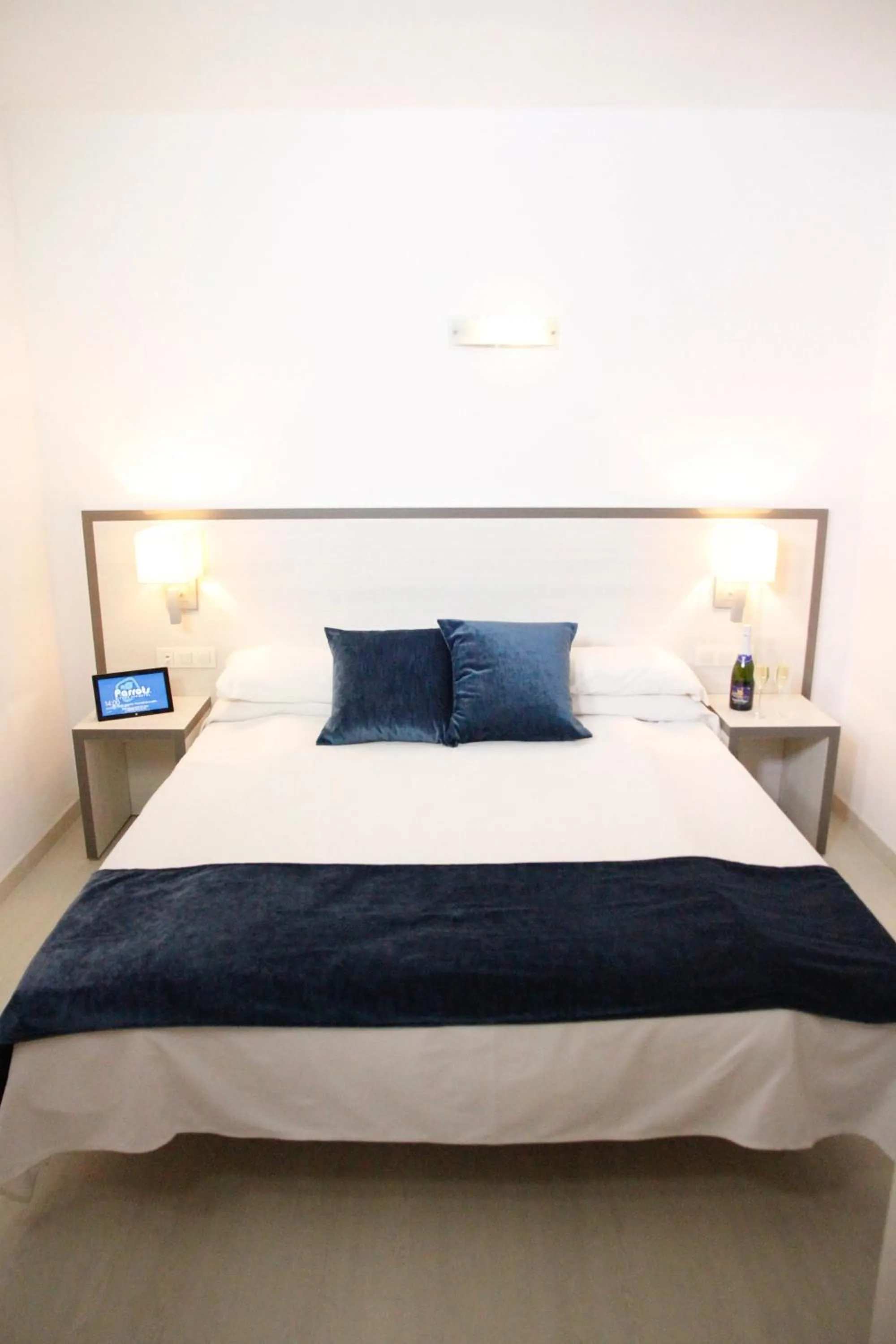 Bed in Parrots Sitges Hotel