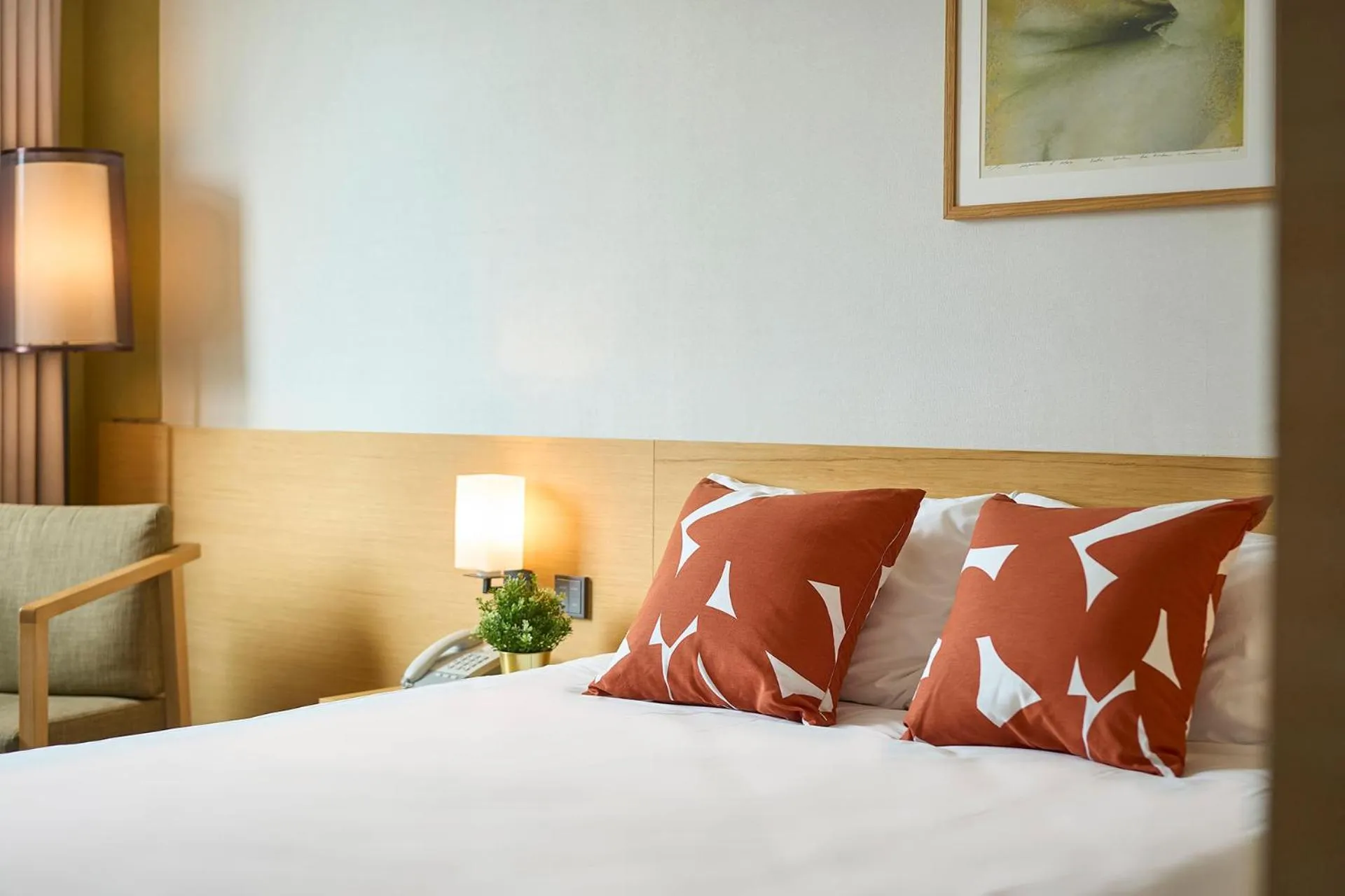 Bed in Jeju Central City Hotel