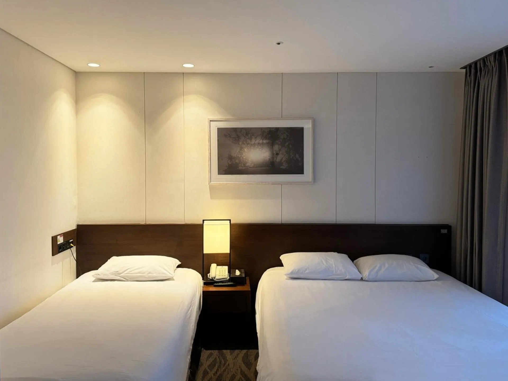 Bed in Jeju Central City Hotel
