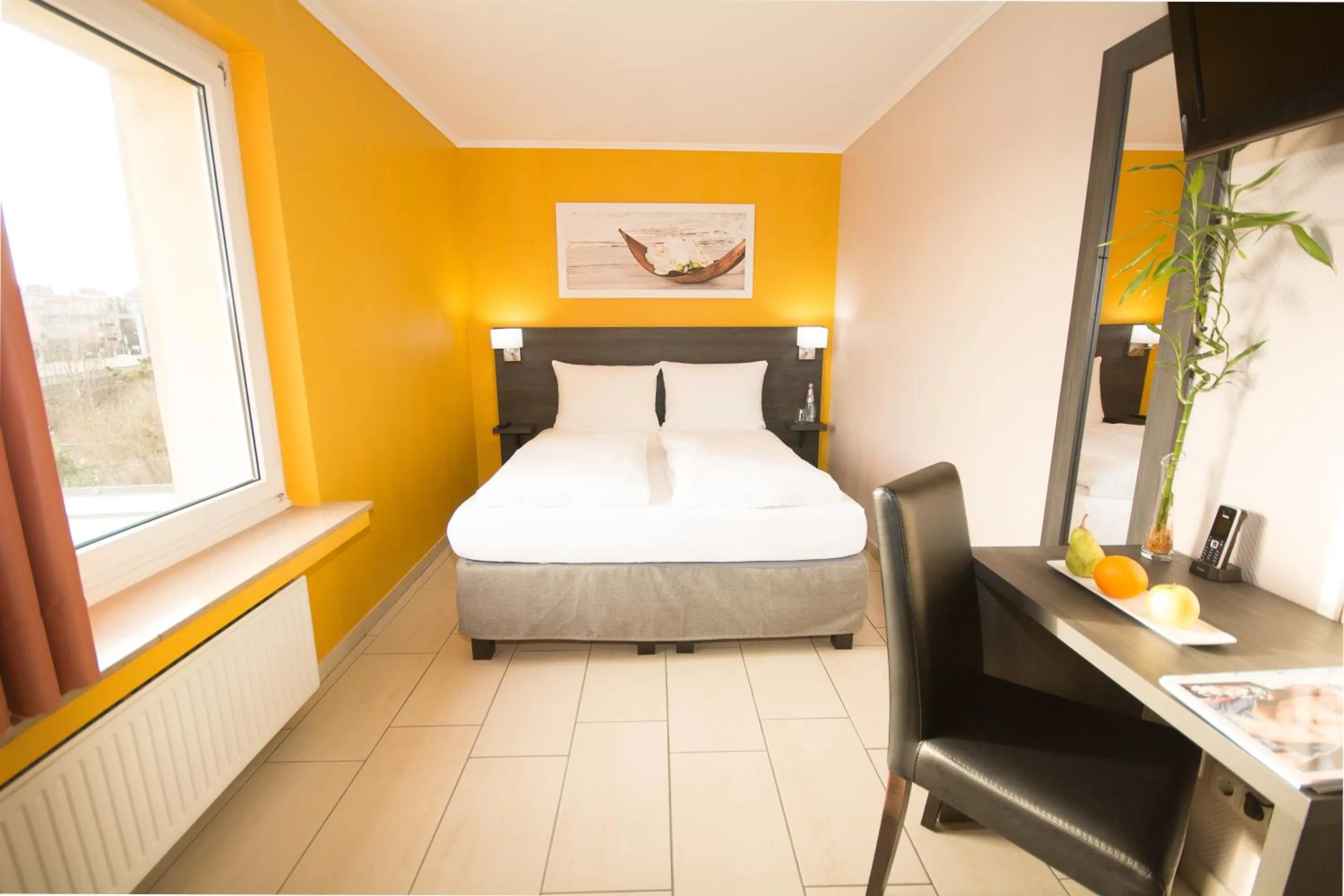 Photo of the whole room, Bed in BIVIUS Hotel Restaurant Luxembourg