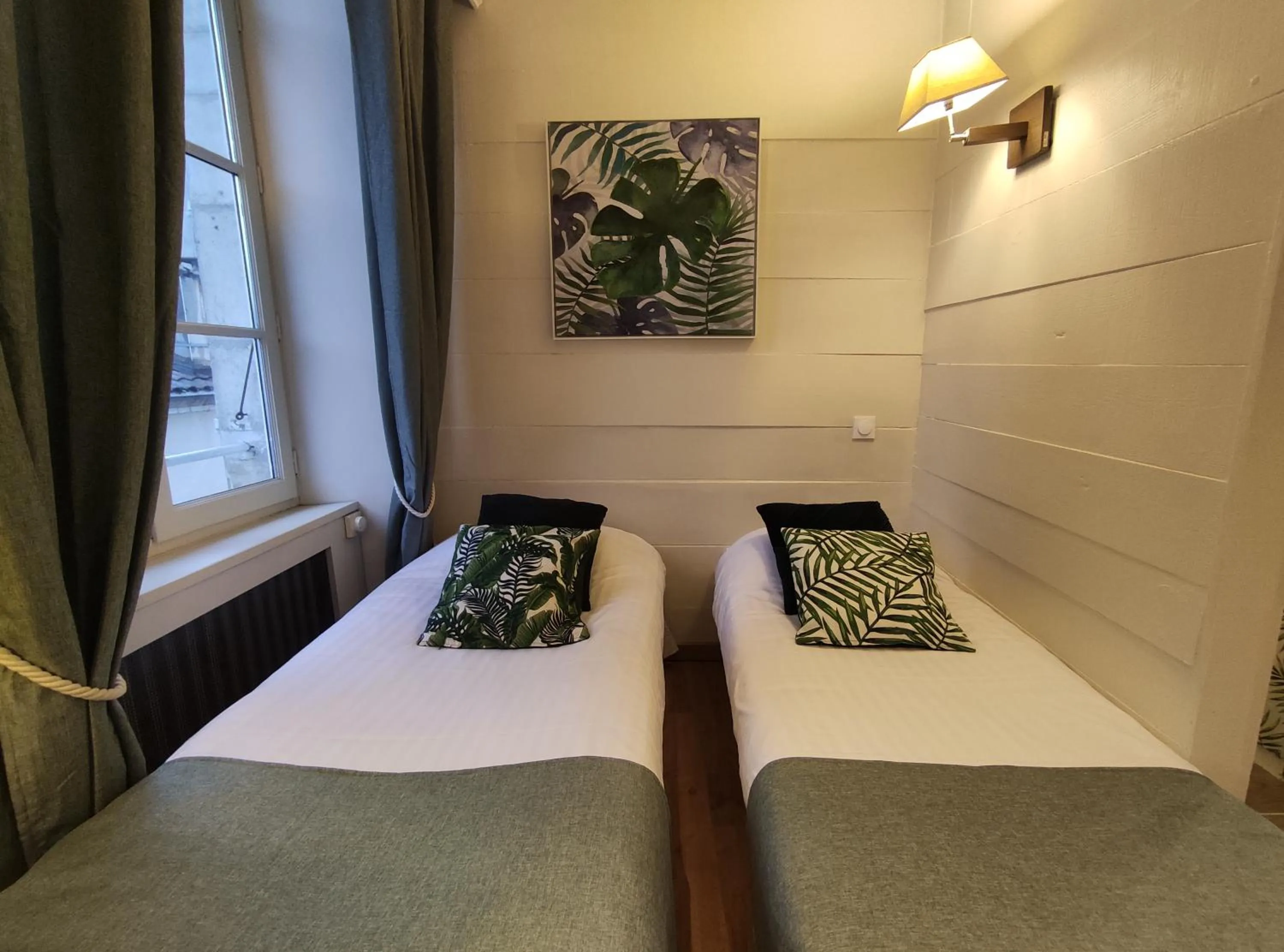 Bed in Le Pavillon Saint-Martin