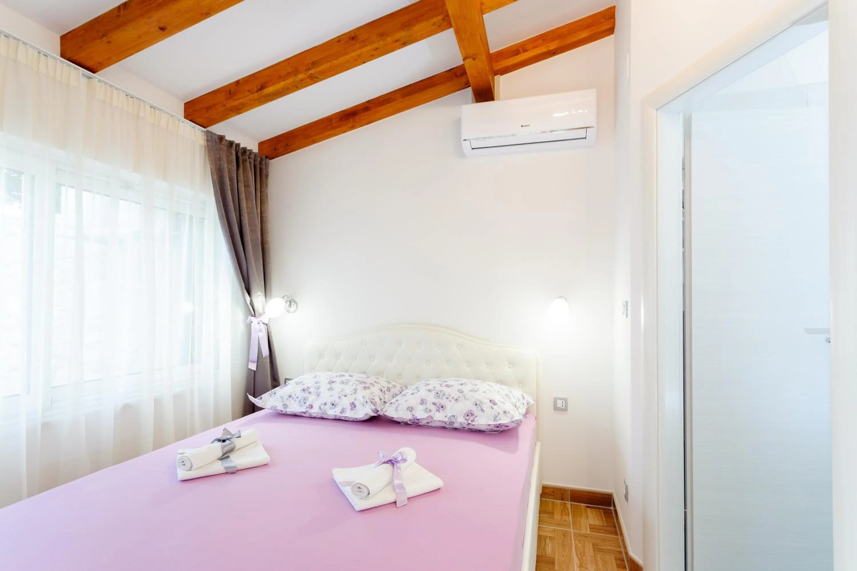 Bed in Apartment and Room Nona Stella